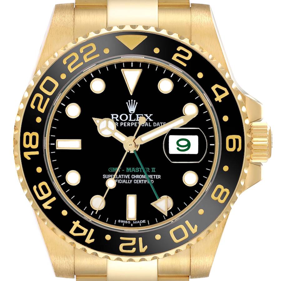 The Rolex GMT-Master model is shown from the front, highlighting its black dial, gold bezel, and distinct hour markers.