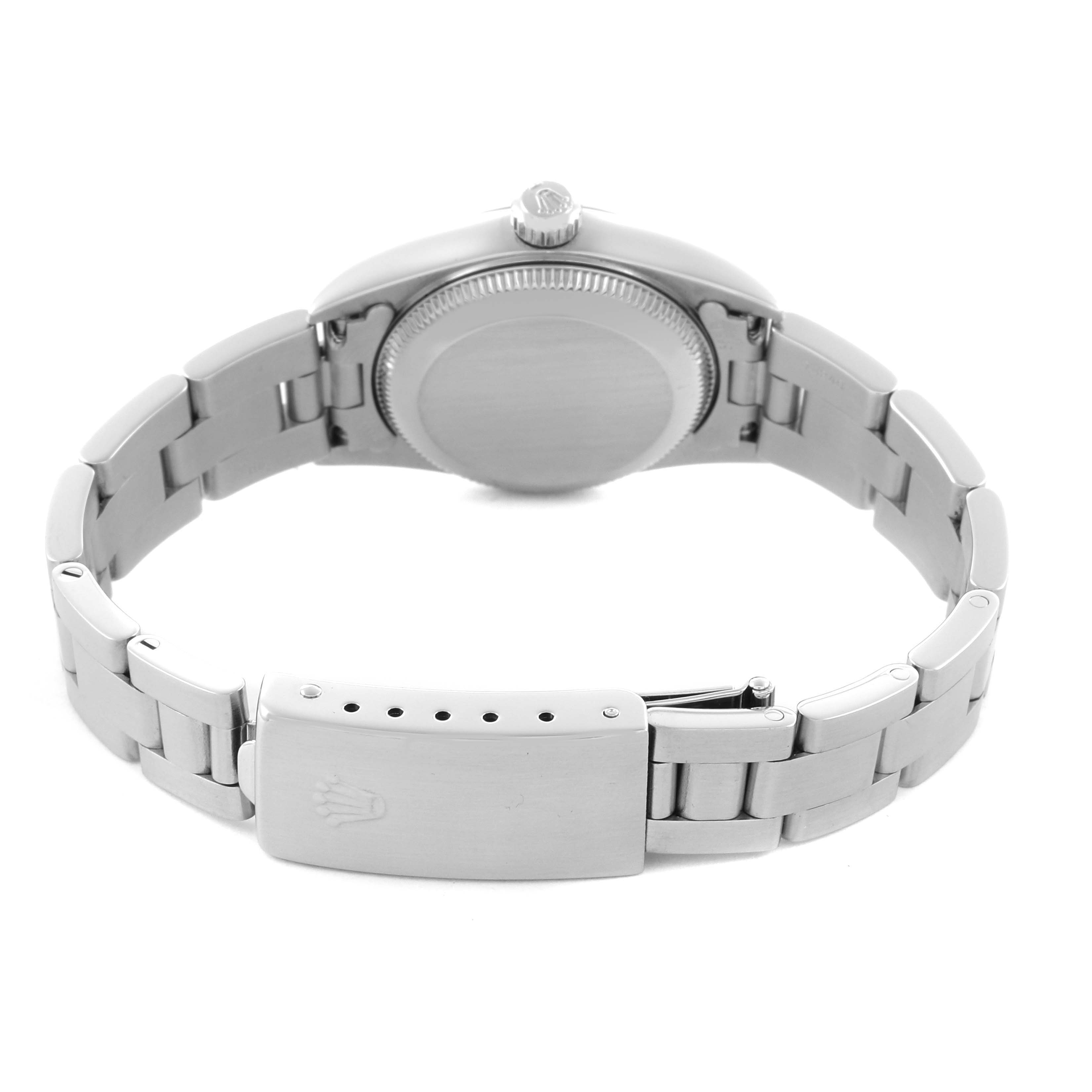 The image shows the Rolex Oyster Perpetual 76080 Women's Stainless Steel Pink Dial 76080 Women's Stainless Steel Pink Dial watch from the back, highlighting the case back, bracelet, and clasp.