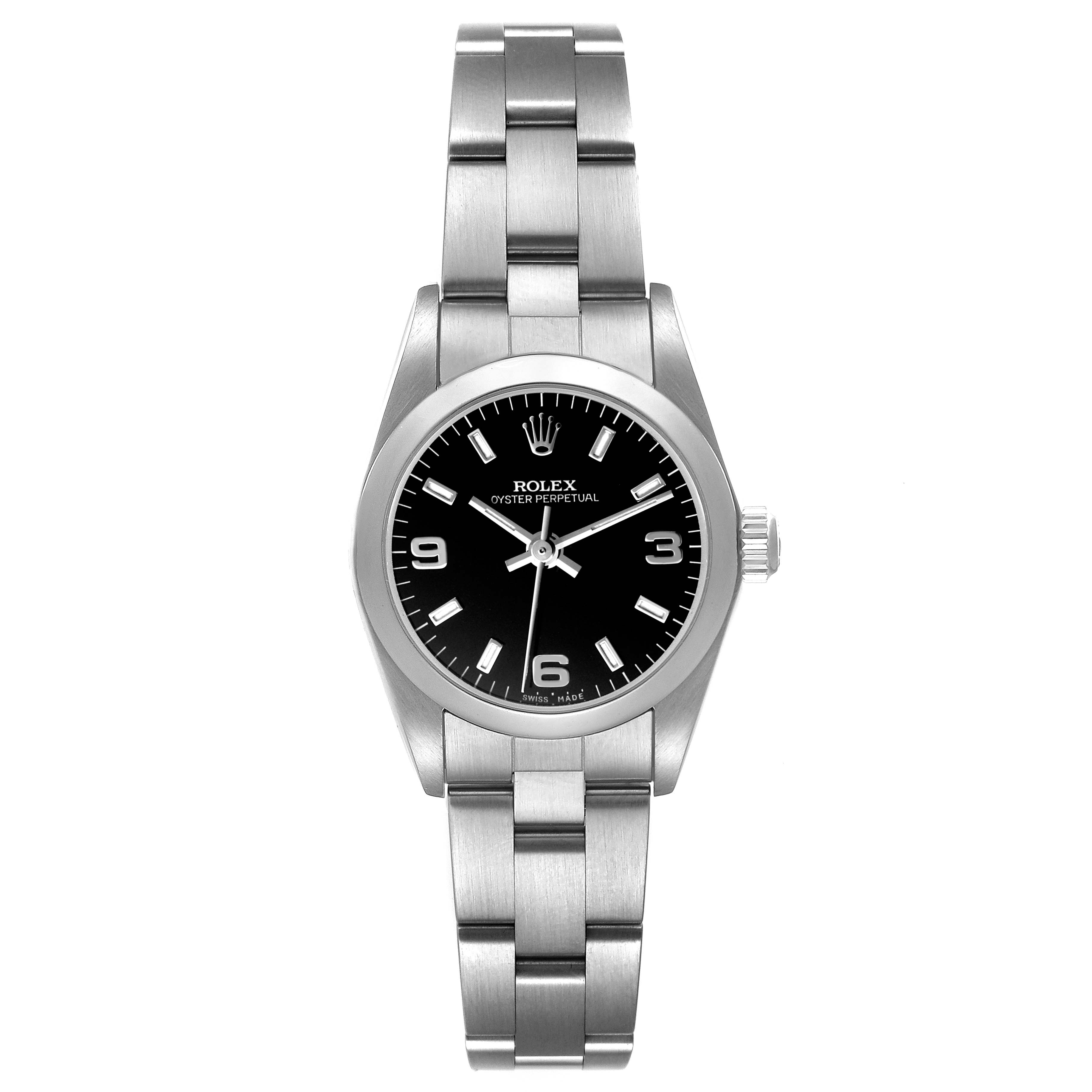 The Rolex Datejust 76080 Women's Stainless Steel Black Dial watch is shown from a top-down angle, highlighting the dial, bezel, and metal bracelet.