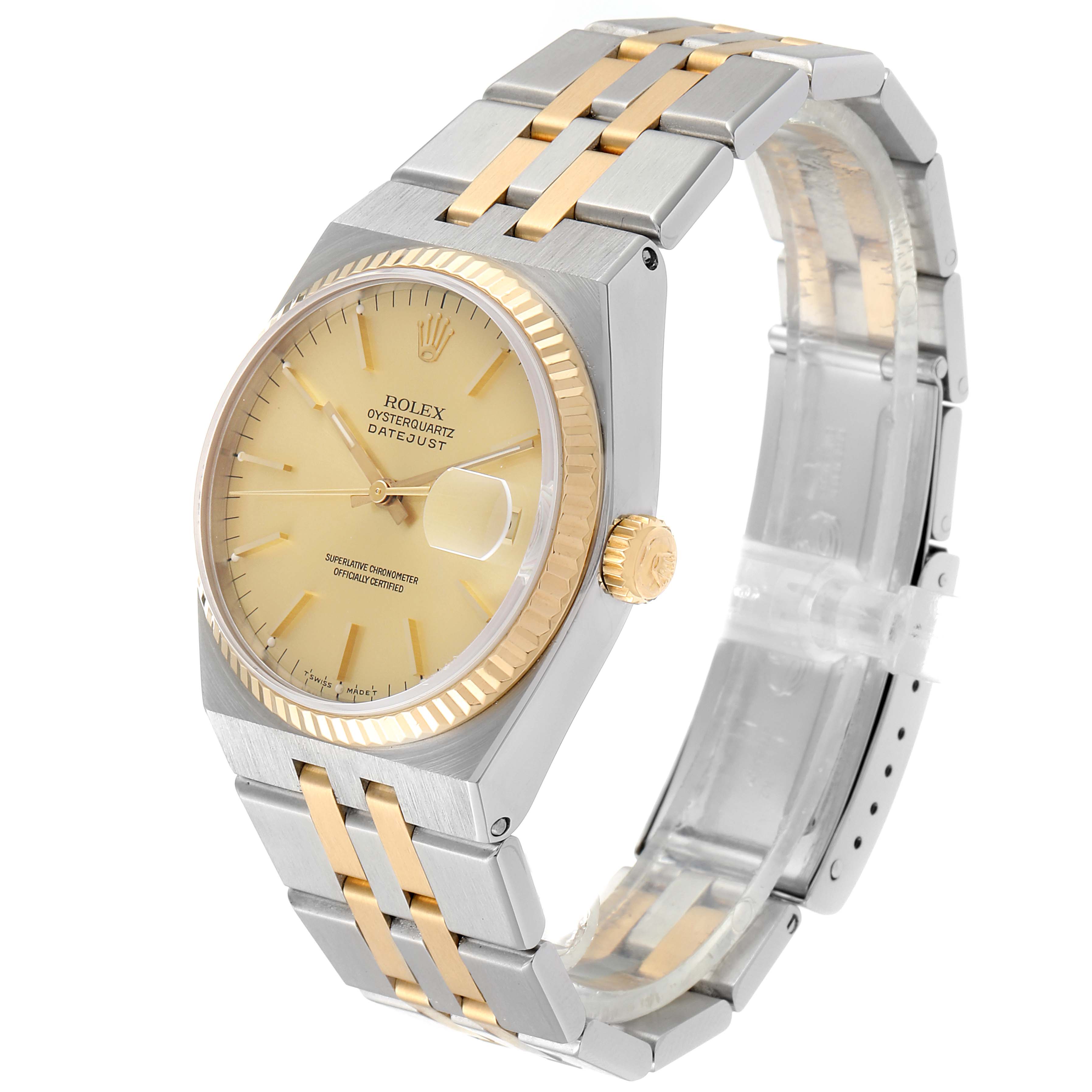 The Rolex Oysterquartz 17013 Men's Steel and Gold (two tone) Champagne Dial 17013 Men's Steel and Gold (two tone) Champagne Dial watch is shown at a side angle, displaying its dial, bezel, crown, and two-tone bracelet.