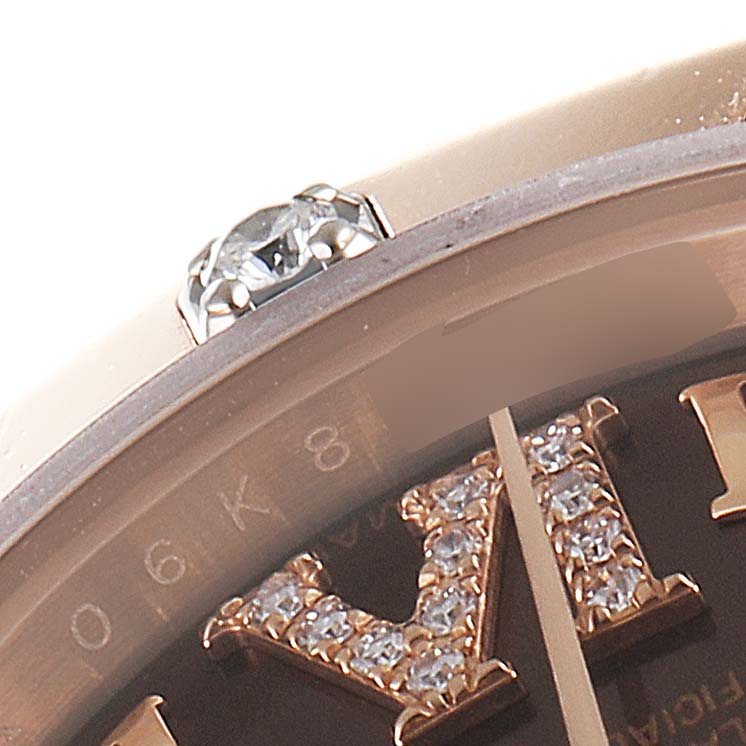The close-up angle shows the jeweled bezel and part of the dial of a Rolex Pearlmaster 80315 Women's Rose Gold Brown Dial 80315 Women's Rose Gold Brown Dial watch.