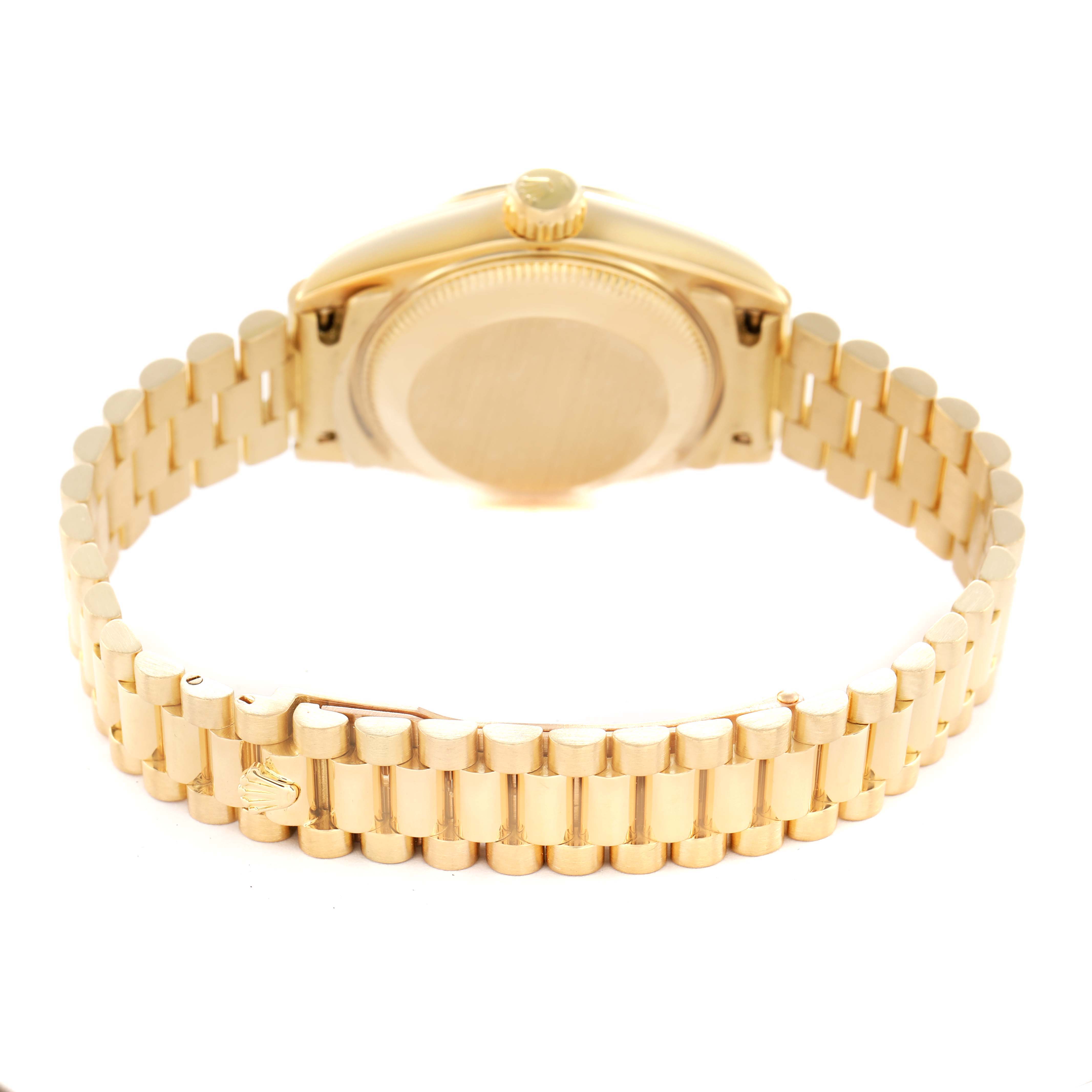 The image shows the back and bracelet of a Rolex President 69268 Women's Yellow Gold Champagne Dial model, focusing on the case back and gold link bracelet.