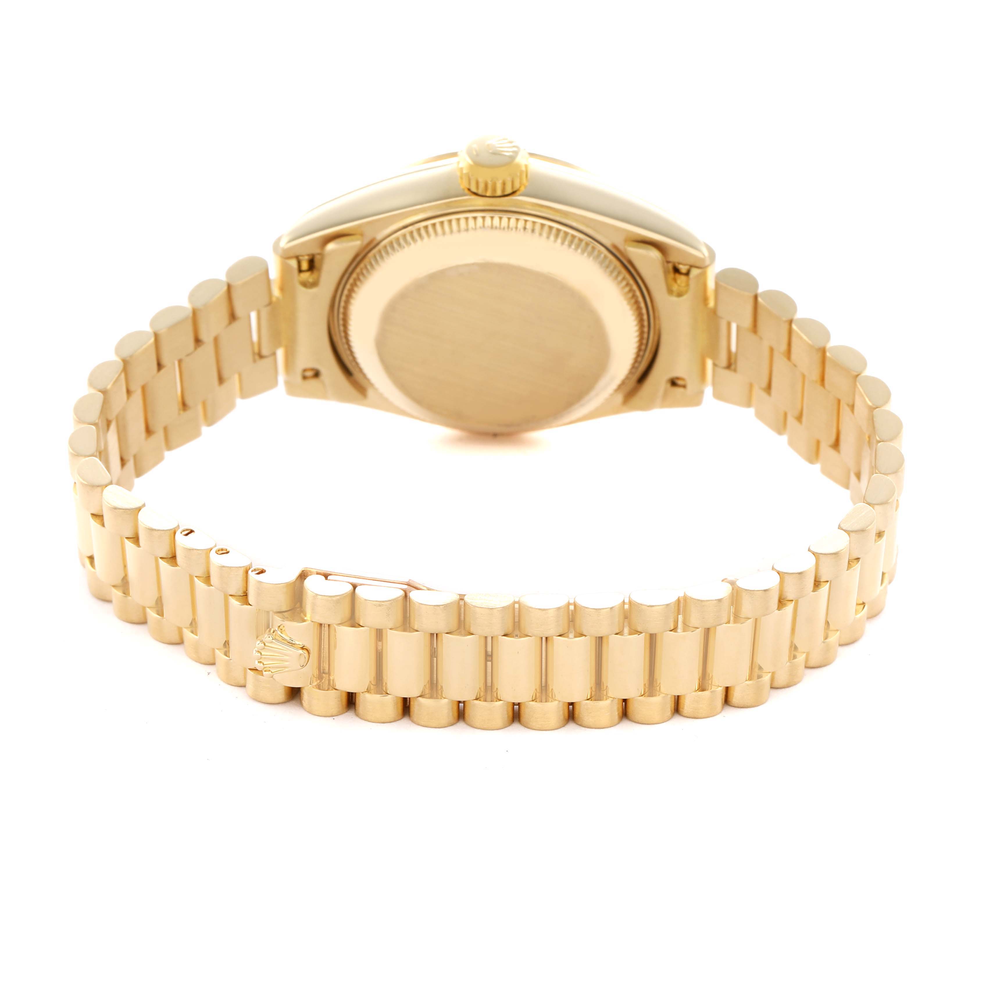The Rolex President 69178 Women's Yellow Gold Champagne Dial model watch is shown from the back, displaying the bracelet and case back.