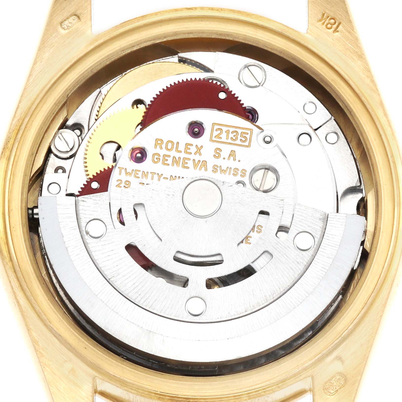 The image shows the movement of a Rolex President 69178 Women's Yellow Gold Champagne Dial watch, viewed from the back, highlighting the rotor and gears.