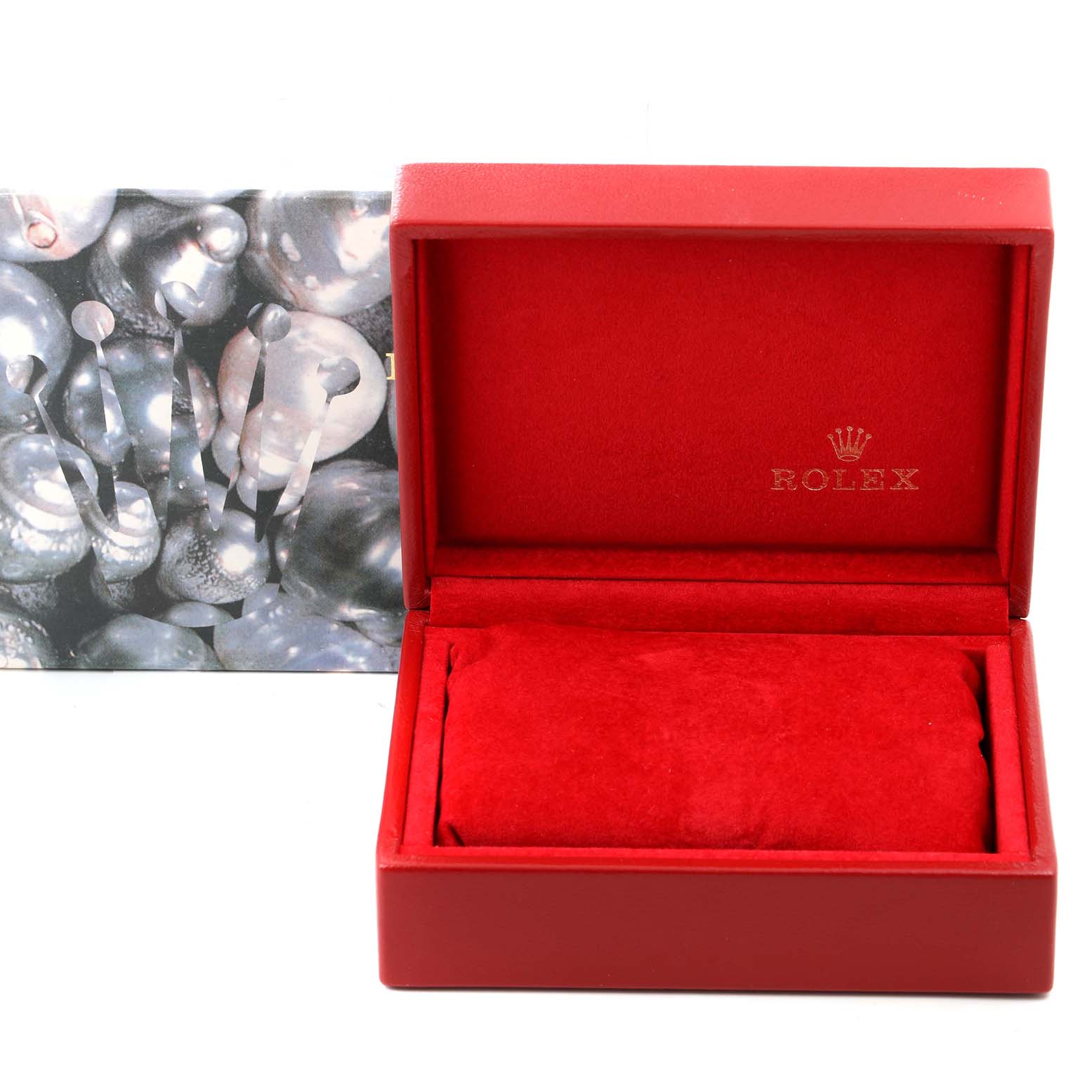 This image shows an open red Rolex box, intended for the President model watch, with a cushion inside and branding on the interior.
