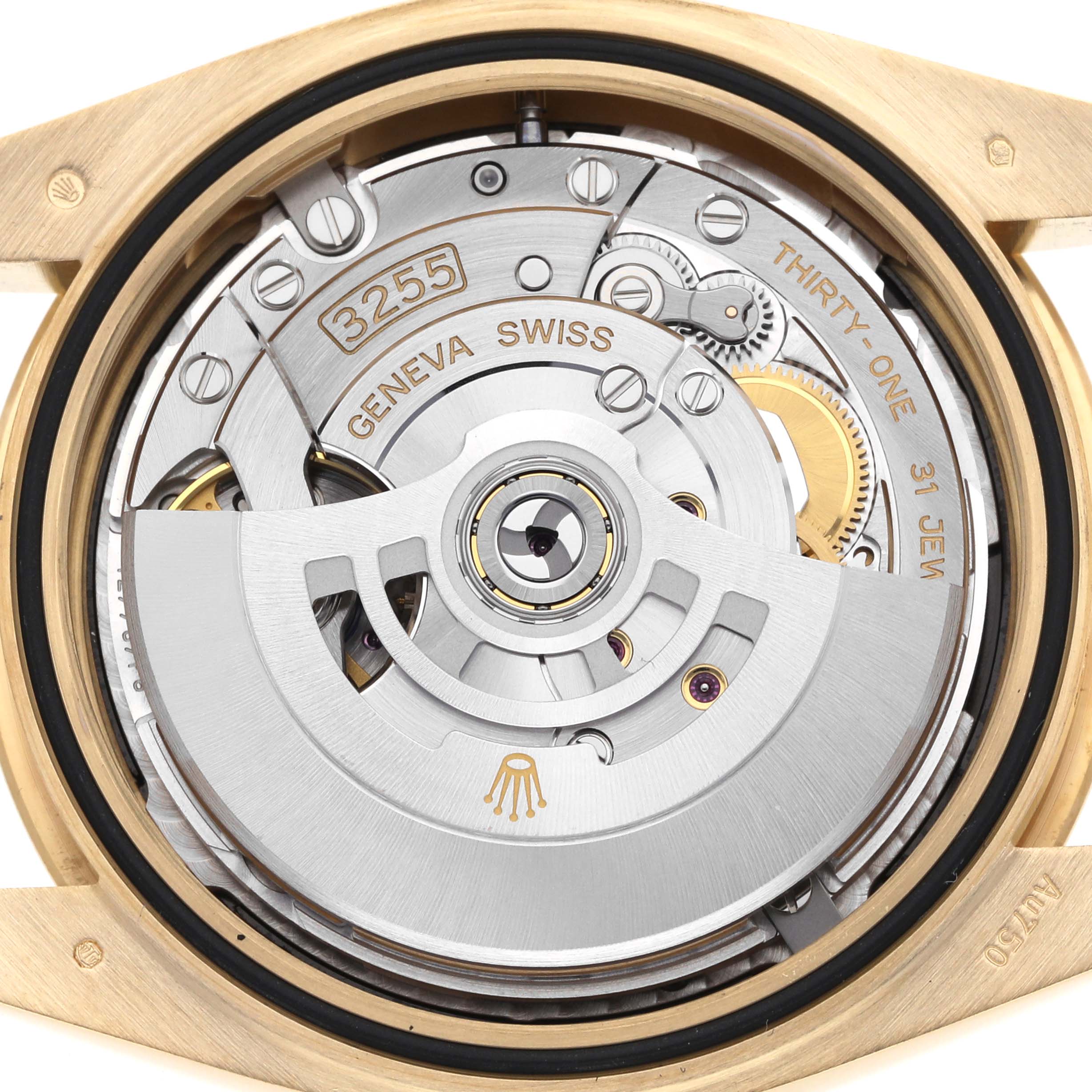 The image shows the back view of the Rolex President 228238 Men's Yellow Gold Black Dial model, focusing on its inner movement and mechanism.