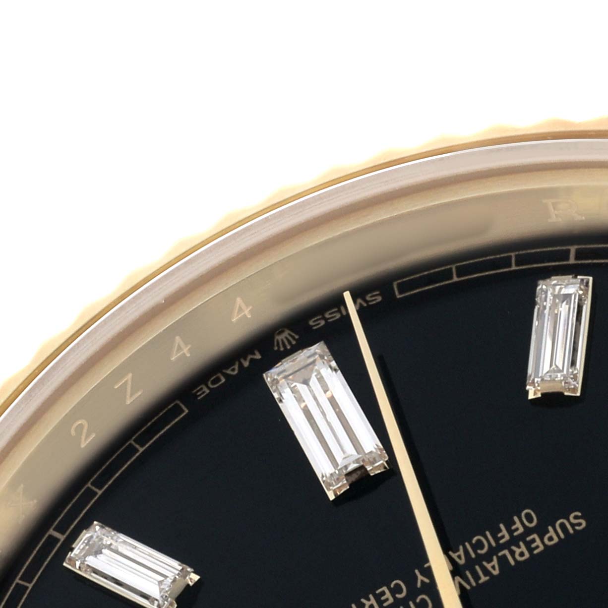 The image shows a close-up of the Rolex President 228238 Men's Yellow Gold Black Dial watch face, highlighting the diamond hour markers and part of the bezel.