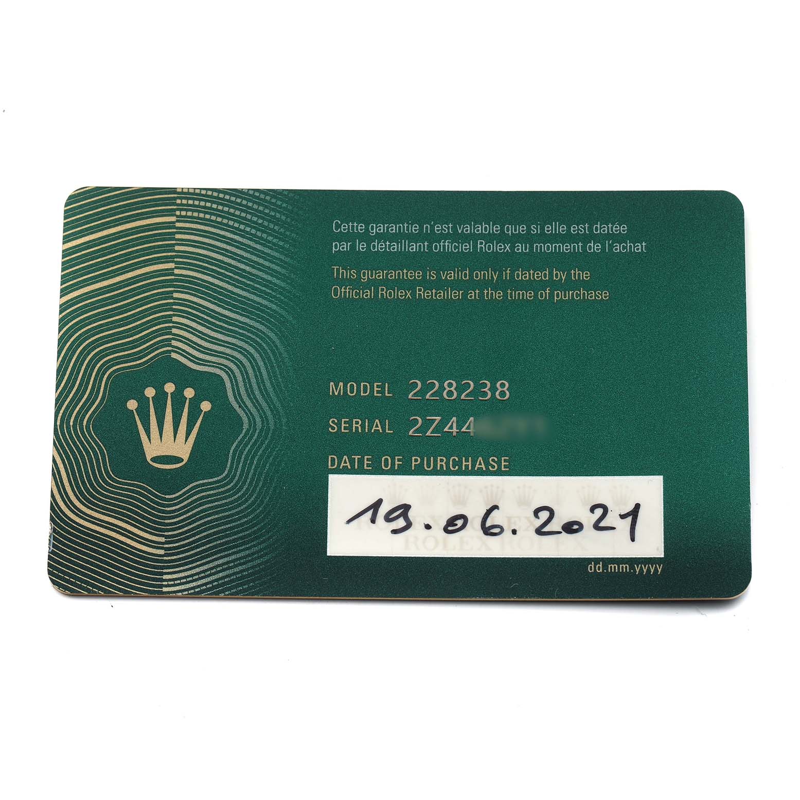 The image shows a Rolex President 228238 Men's Yellow Gold Black Dial model warranty card, displaying model, serial number, and purchase date details.