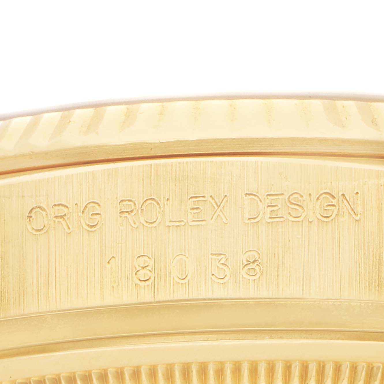 The image shows the case side engraving of a Rolex President 18038 Men's Yellow Gold Champagne Dial model, highlighting "Orig Rolex Design 18038."