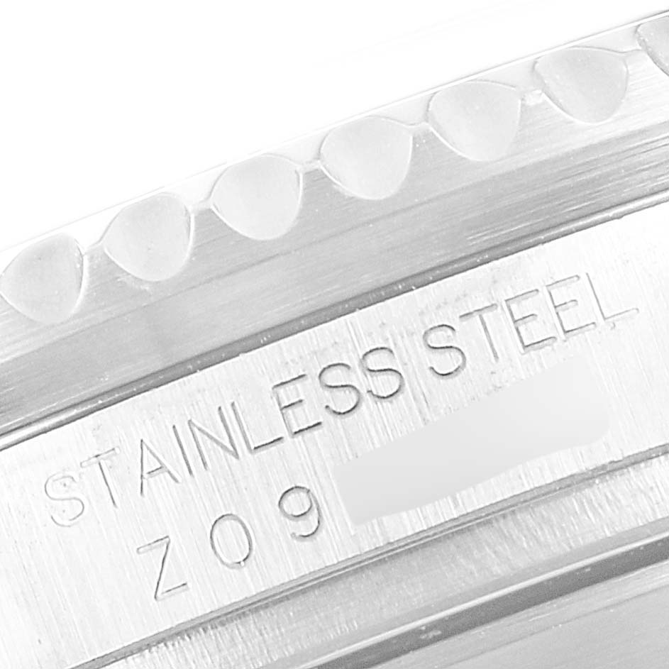 The image shows a close-up of the stainless steel case back of a Rolex Sea-Dweller 16600 Men
s Stainless Steel Black Dial 16600 Men
s Stainless Steel Black Dial watch, highlighting the model and steel material engraving.