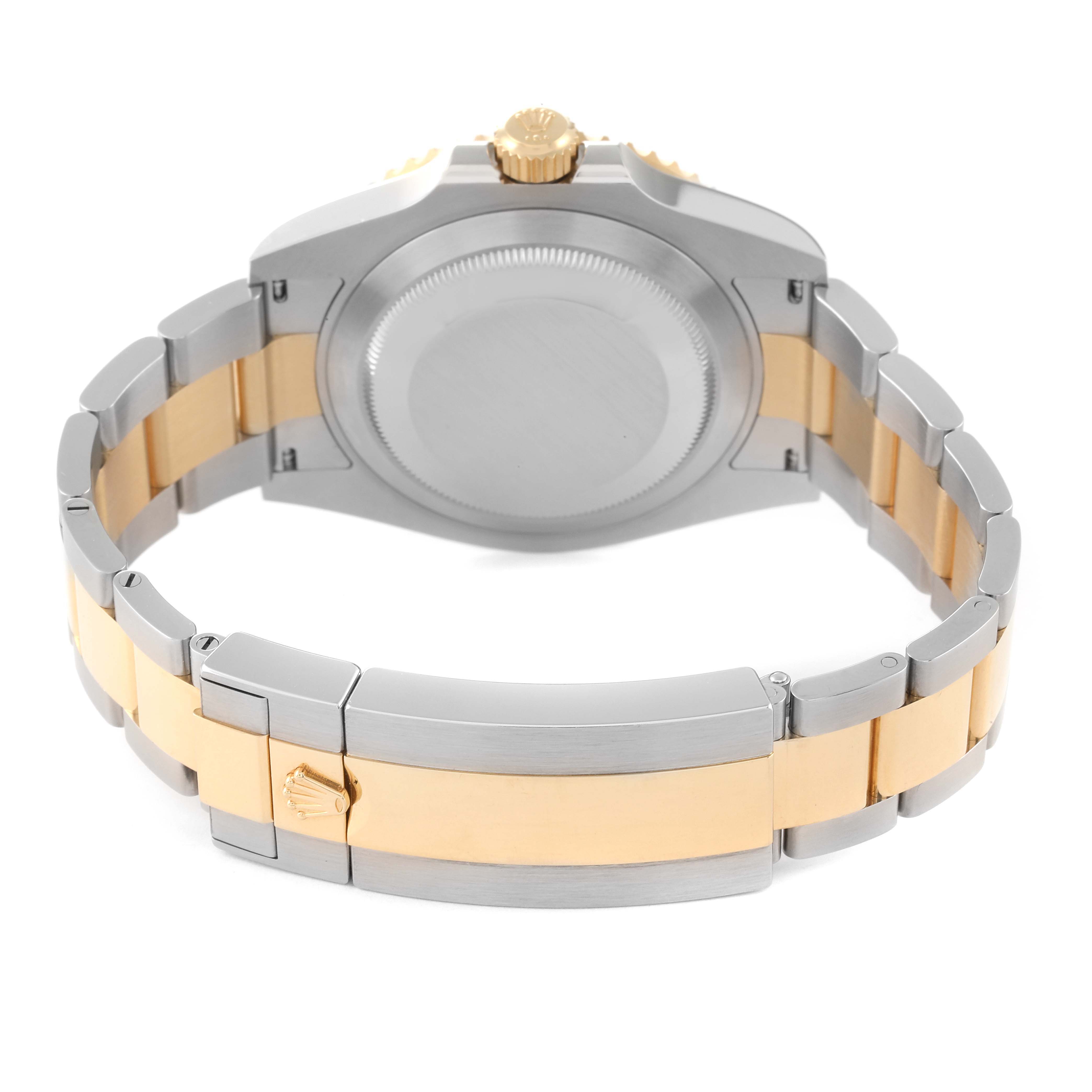 The image shows the back case and two-tone bracelet of a Rolex Submariner 126613 Men's Steel and Gold (two tone) Blue Dial 126613 Men's Steel and Gold (two tone) Blue Dial watch.