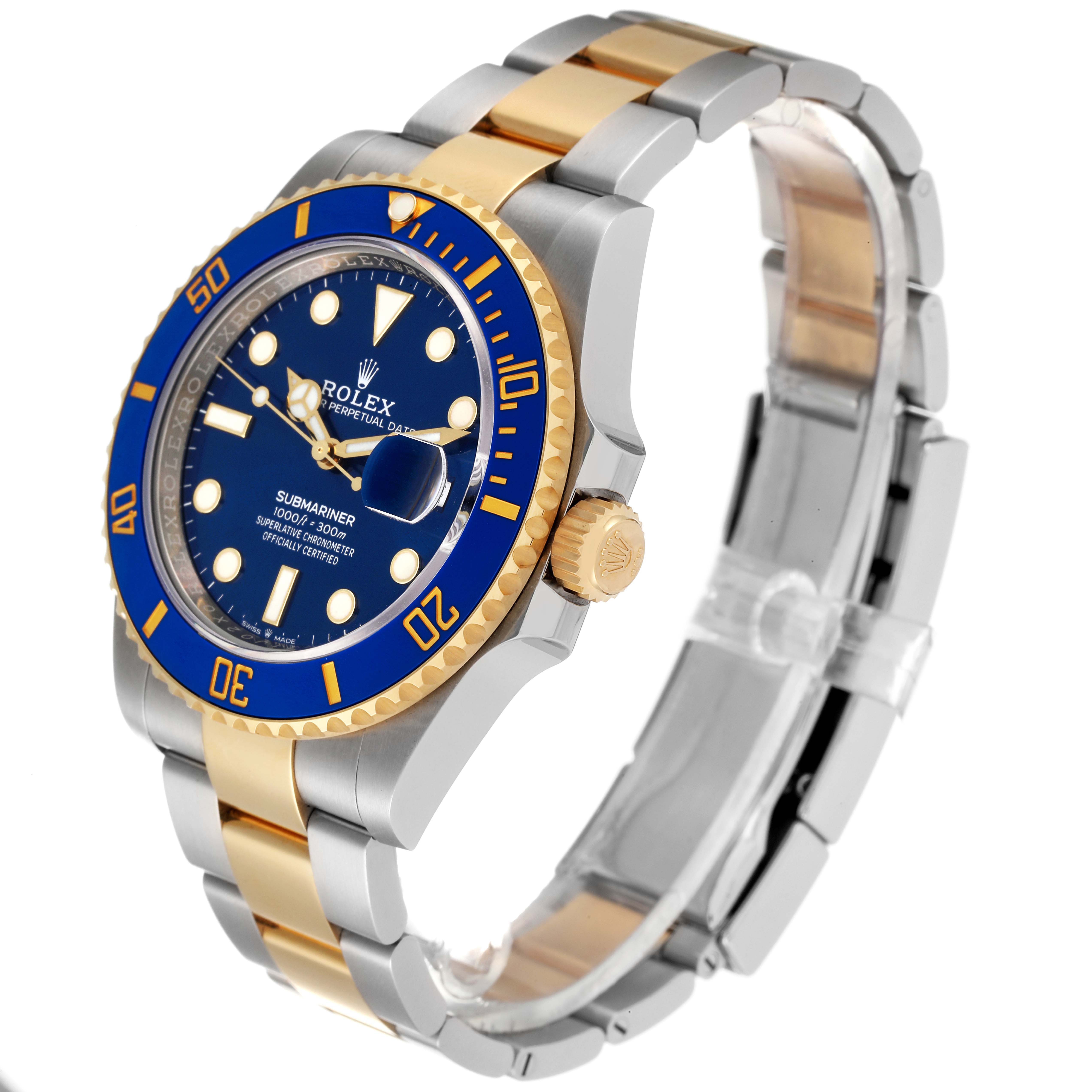 The image shows a Rolex Submariner 126613 Men's Steel and Gold (two tone) Blue Dial 126613 Men's Steel and Gold (two tone) Blue Dial watch at an angle highlighting the blue dial, gold bezel, and two-tone bracelet.