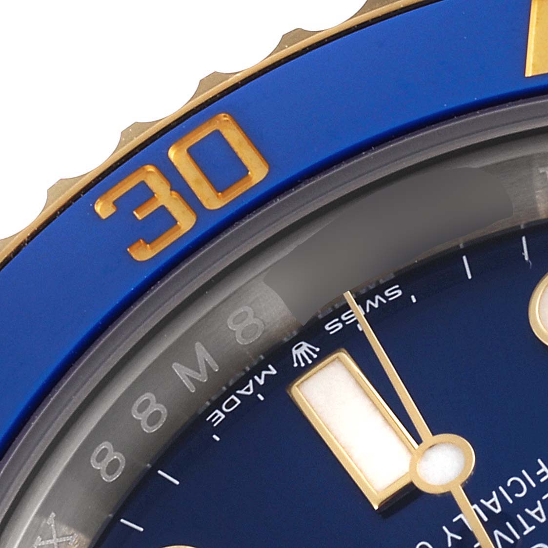 This close-up angle shows the bezel with a "30" marker and a portion of the dial of the Rolex Submariner 126613LB Men's Steel and Gold (two tone) Blue Dial 126613LB Men's Steel and Gold (two tone) Blue Dial.