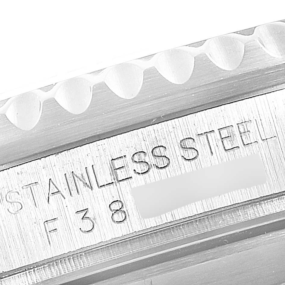 This image shows a close-up of the stainless steel case and part of the bezel of a Rolex Submariner 16610 Men
s Stainless Steel Black Dial 16610 Men
s Stainless Steel Black Dial watch.