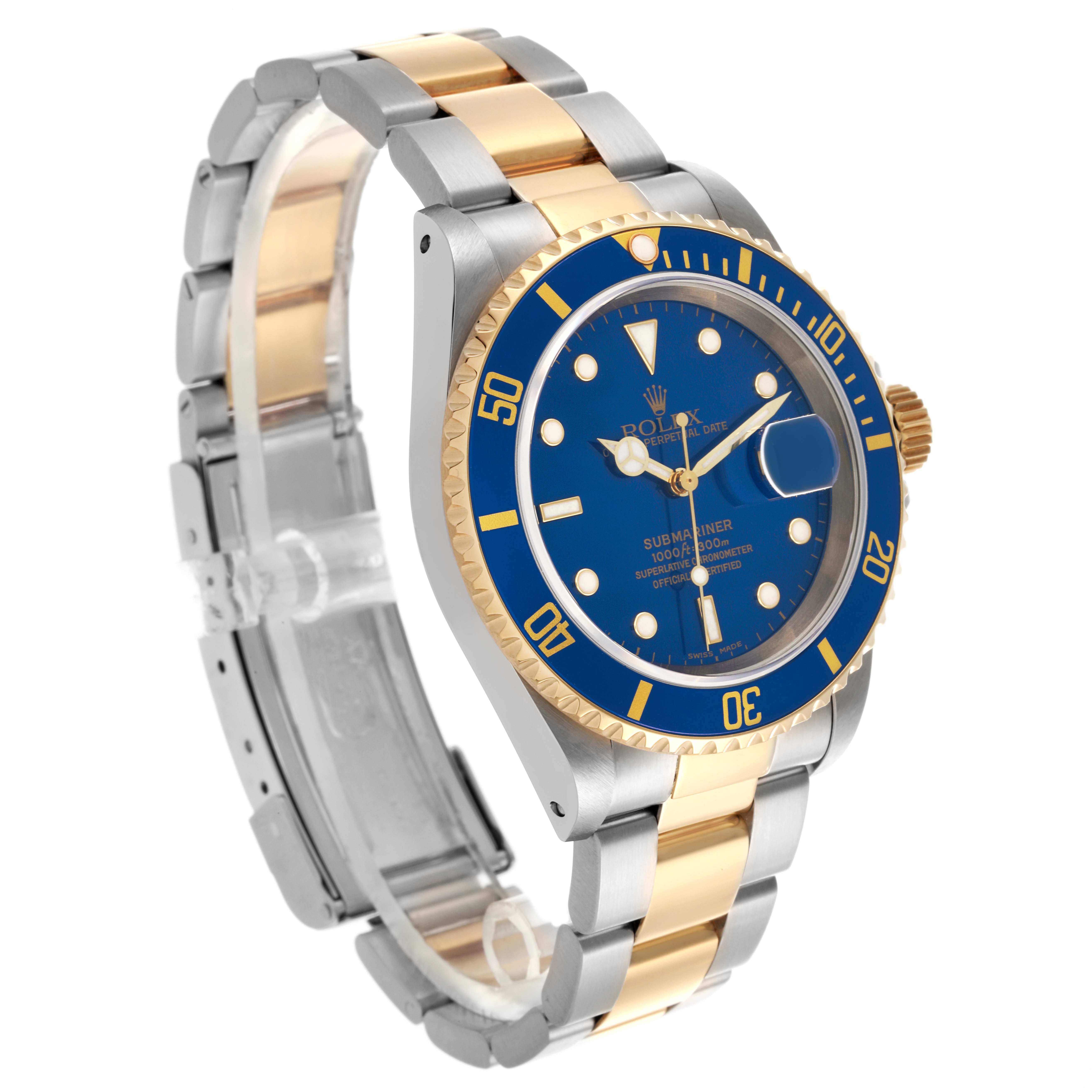The Rolex Submariner 16613 Men's Steel and Gold (two tone) Blue Dial 16613 Men's Steel and Gold (two tone) Blue Dial watch is shown at an angled side view, highlighting its blue dial and two-tone bracelet.