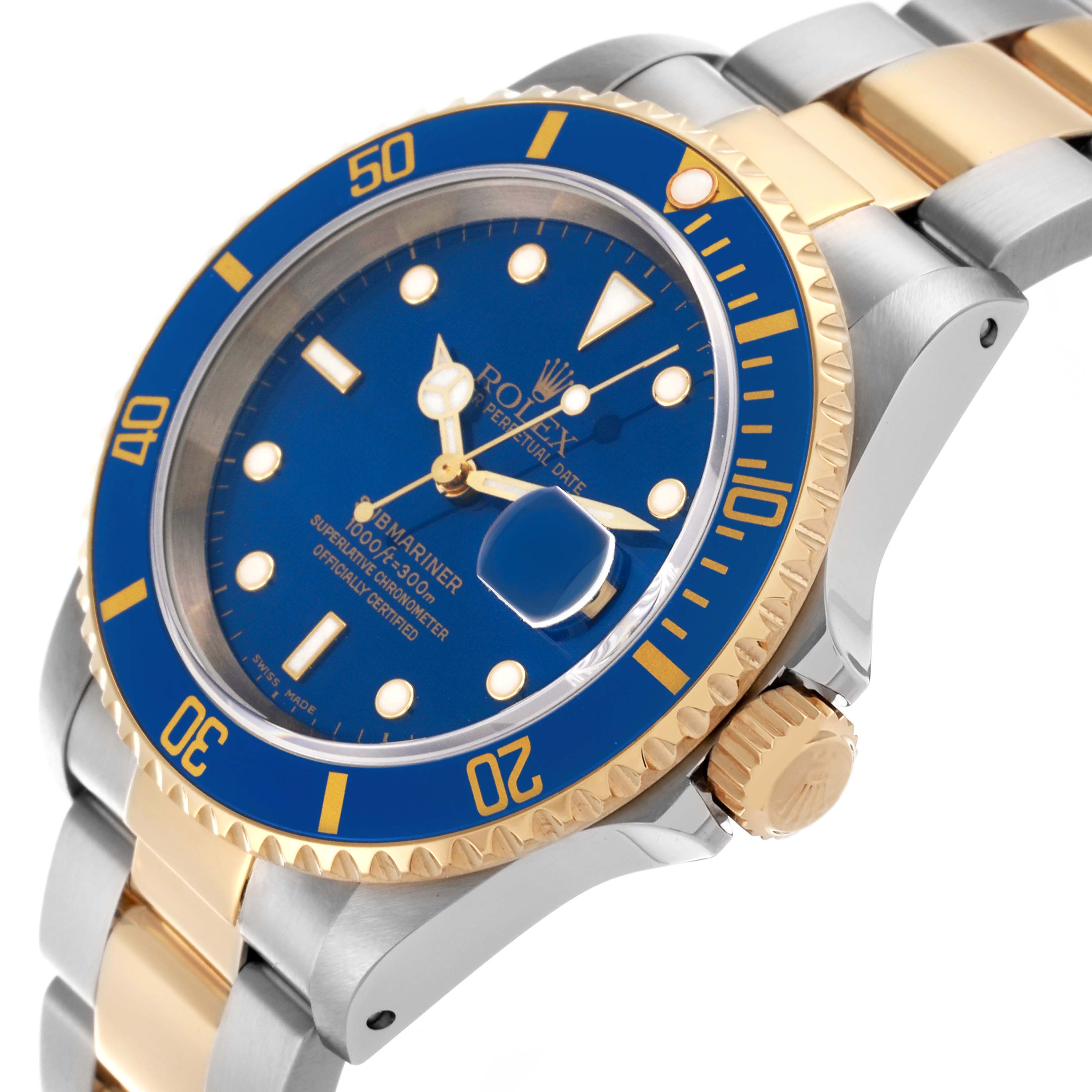 The image shows the Rolex Submariner 16613 Men's Steel and Gold (two tone) Blue Dial 16613 Men's Steel and Gold (two tone) Blue Dial's face, bezel, crown, and part of the bracelet from an angled side view.