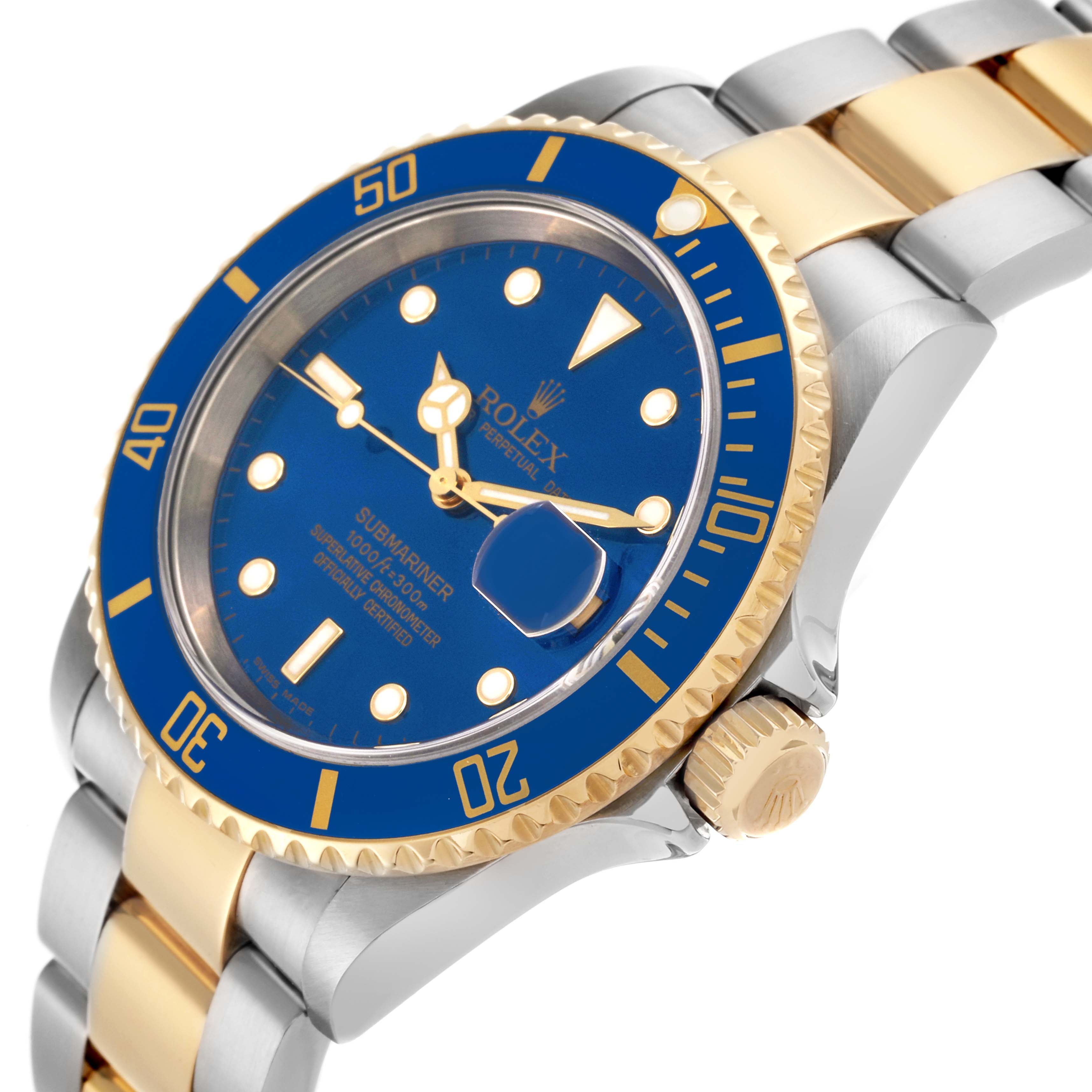 The Rolex Submariner 16613 Men's Steel and Gold (two tone) Blue Dial 16613 Men's Steel and Gold (two tone) Blue Dial watch is shown at an angled side view, highlighting the blue dial, bezel, crown, and two-tone bracelet.