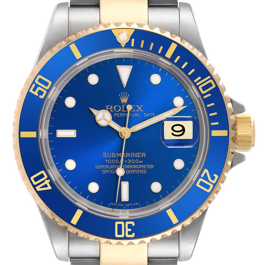 The image shows a close-up of the Rolex Submariner watch face, bezel, crown, and part of the bracelet.