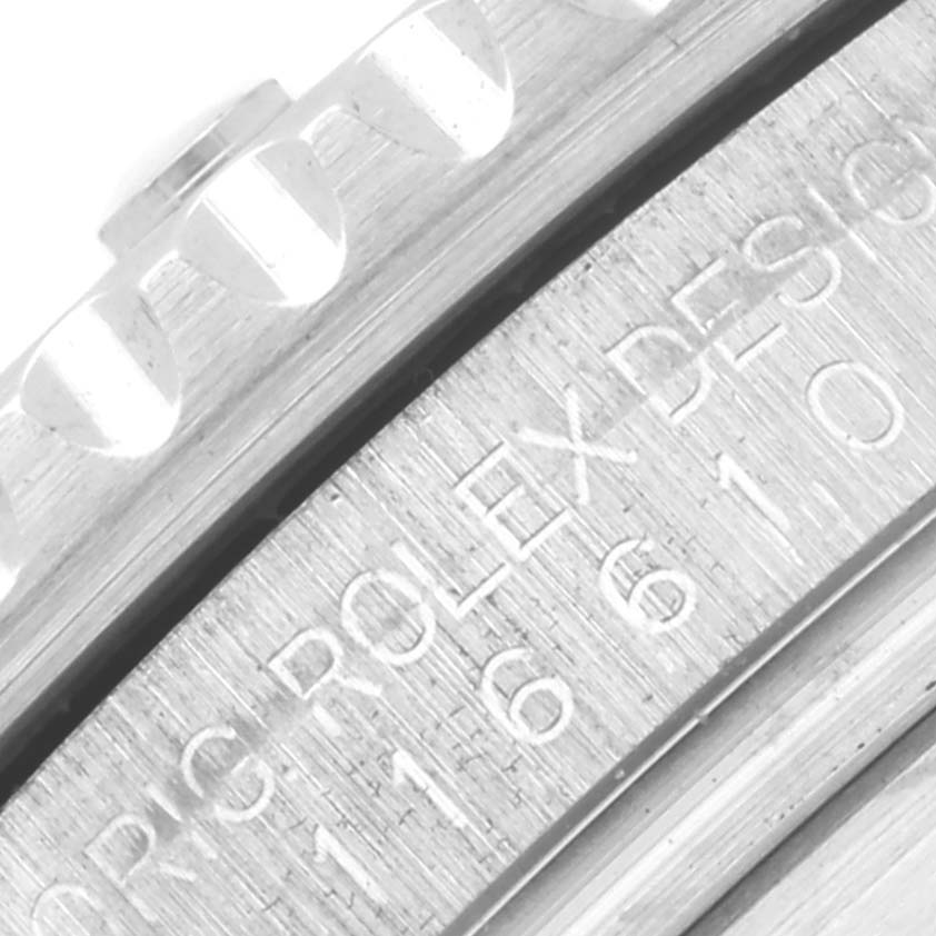 This image shows the engraved side and bezel edge of a Rolex Submariner 116610LV Men's Stainless Steel Green Dial 116610LV Men's Stainless Steel Green Dial watch at a close angle.