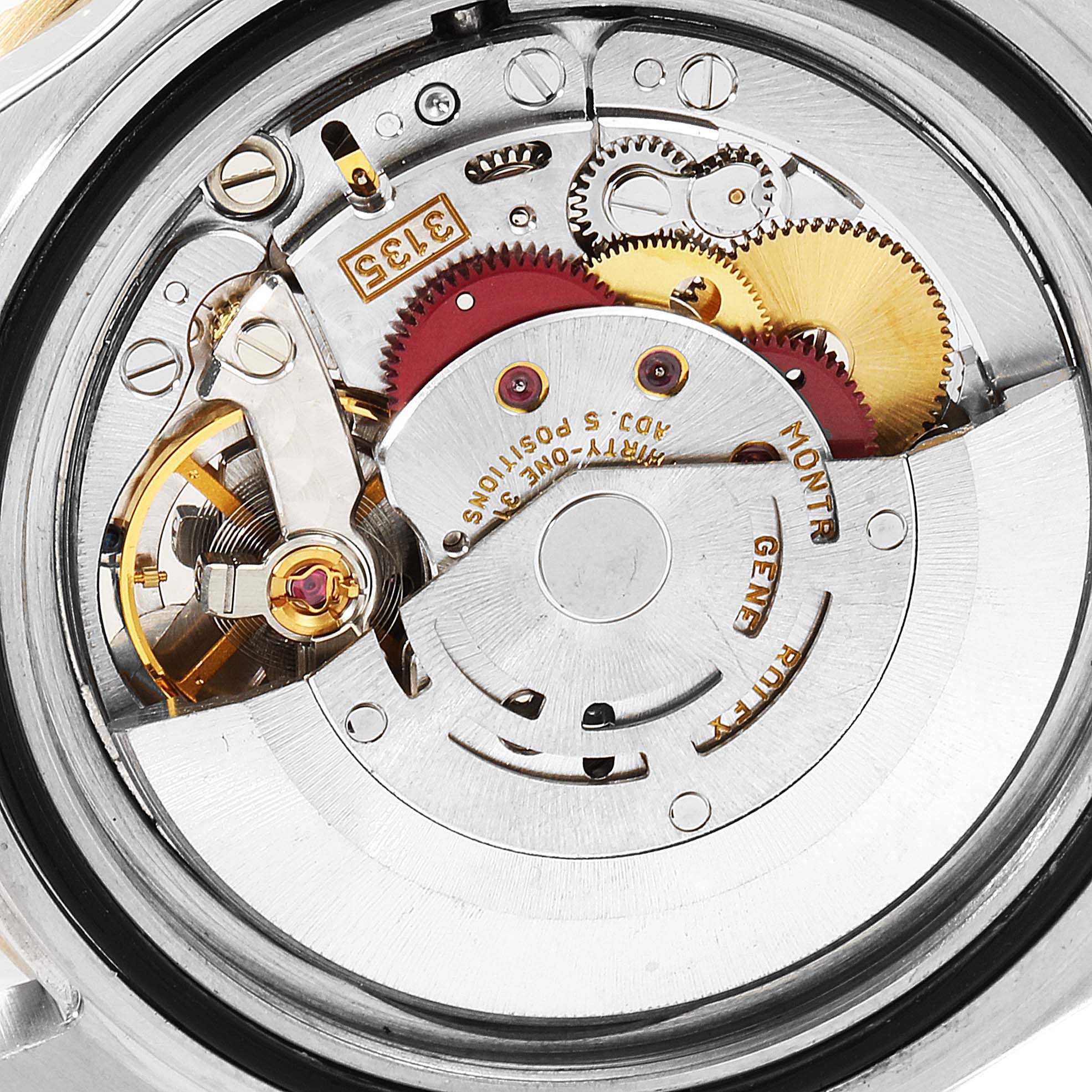 The image shows a close-up of the internal mechanical movement components of a Rolex Submariner 16613 Men's Steel and Gold (two tone) Blue Dial 16613 Men's Steel and Gold (two tone) Blue Dial watch.