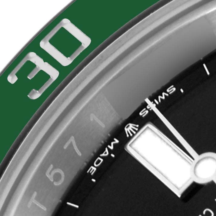 The image shows a close-up of the bezel and part of the dial of a Rolex Submariner 126610LV Men's Stainless Steel Black Dial 126610LV Men's Stainless Steel Black Dial, focusing on the "30" marker and the "Swiss Made" text.