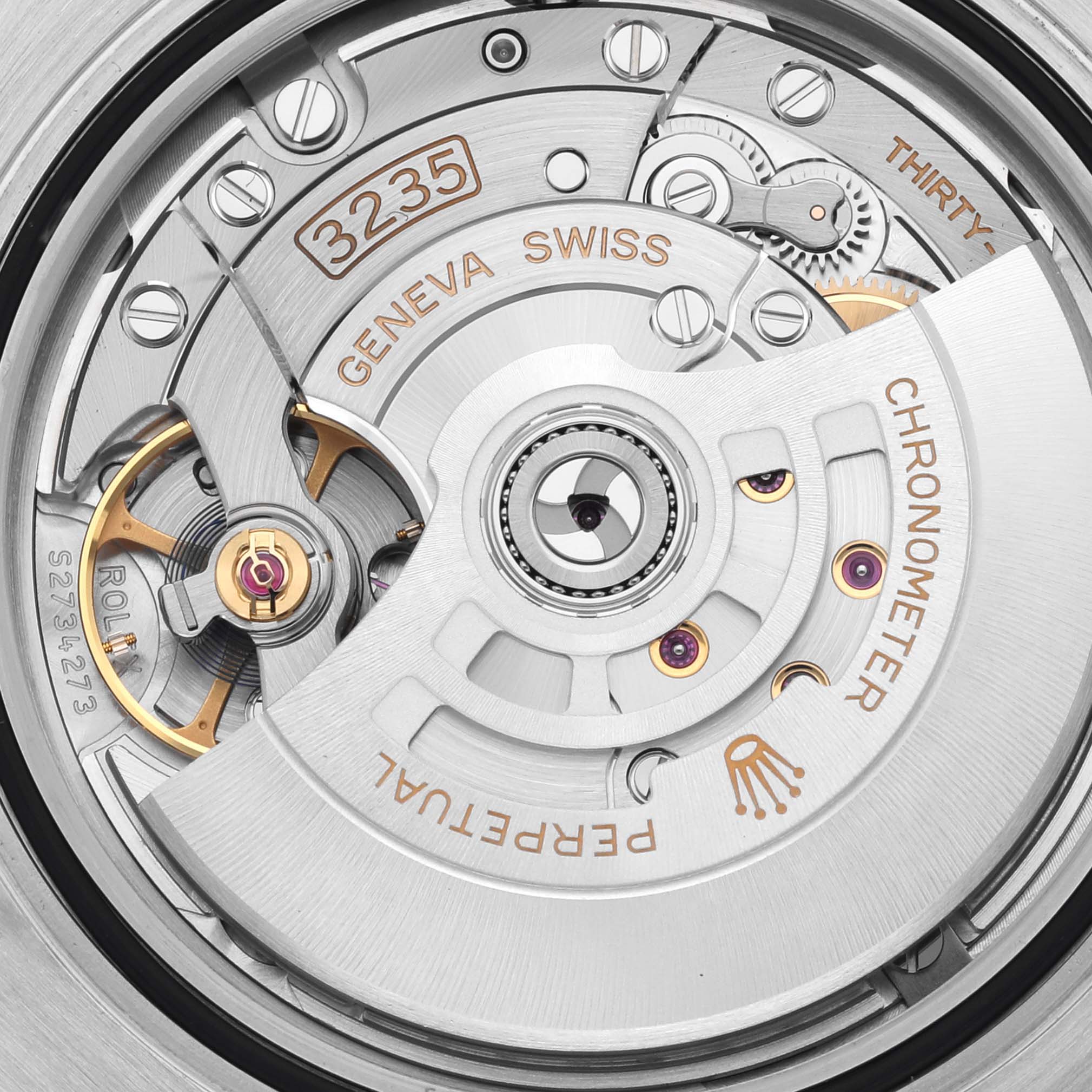 The image shows the movement of a Rolex Submariner 126610LV Men's Stainless Steel Black Dial 126610LV Men's Stainless Steel Black Dial, highlighting parts like the rotor and the balance wheel.