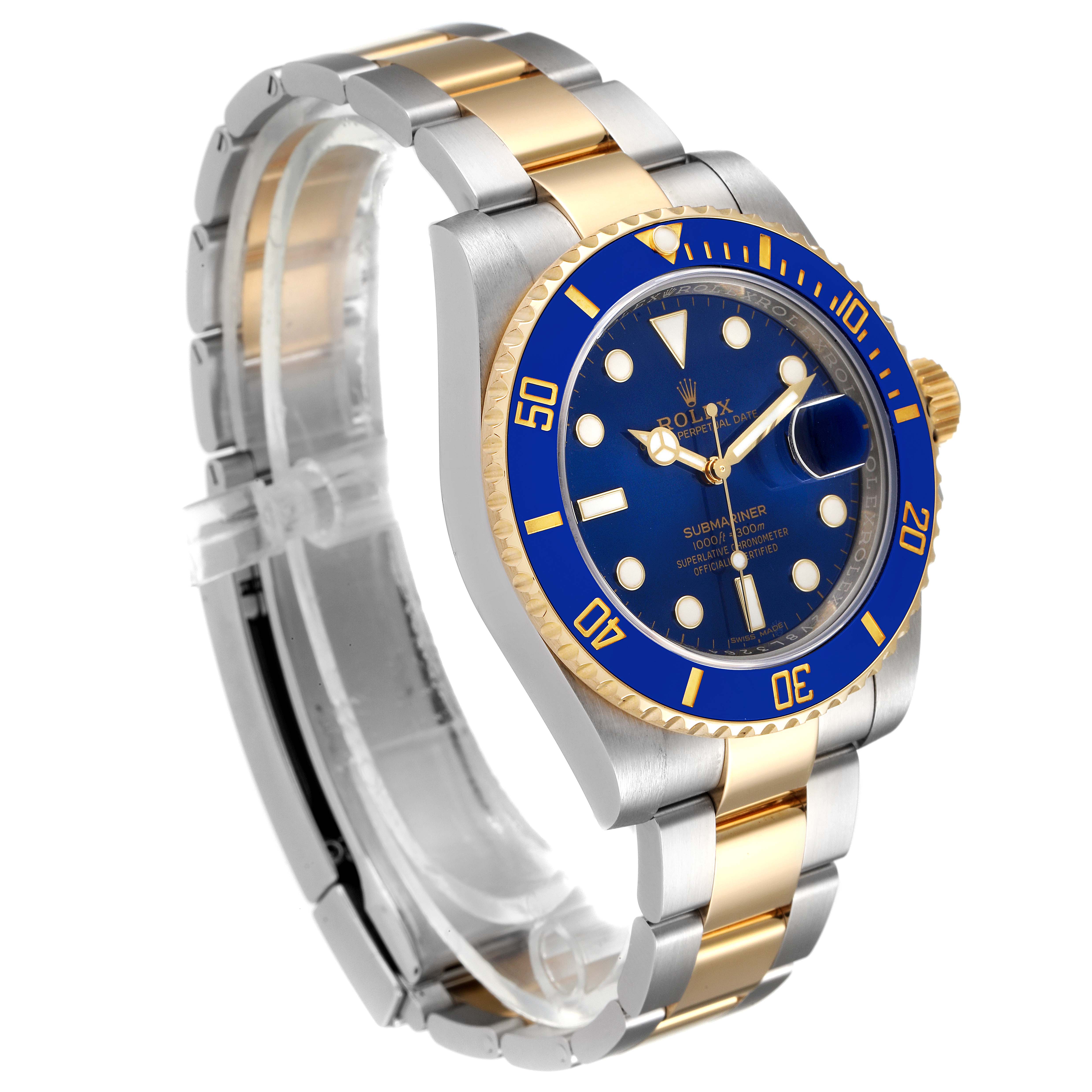 The image shows a Rolex Submariner 116613 Men
s Steel and Gold (two tone) Blue Dial 116613 Men
s Steel and Gold (two tone) Blue Dial watch at an angle showcasing its blue dial, bezel, crown, and two-tone band.