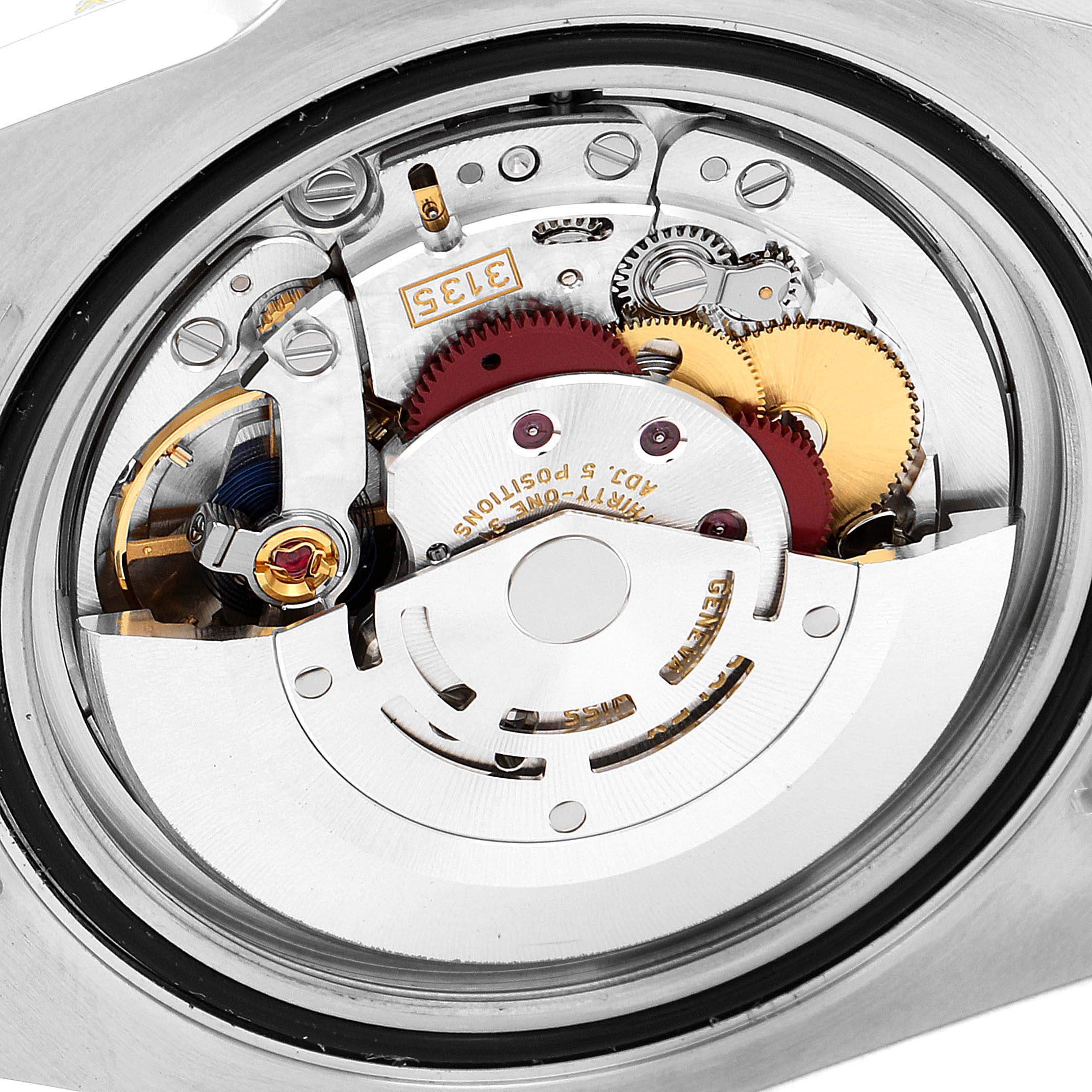 The image shows a close-up view of the movement and internal mechanics of a Rolex Submariner 116613 Men
s Steel and Gold (two tone) Blue Dial 116613 Men
s Steel and Gold (two tone) Blue Dial watch.