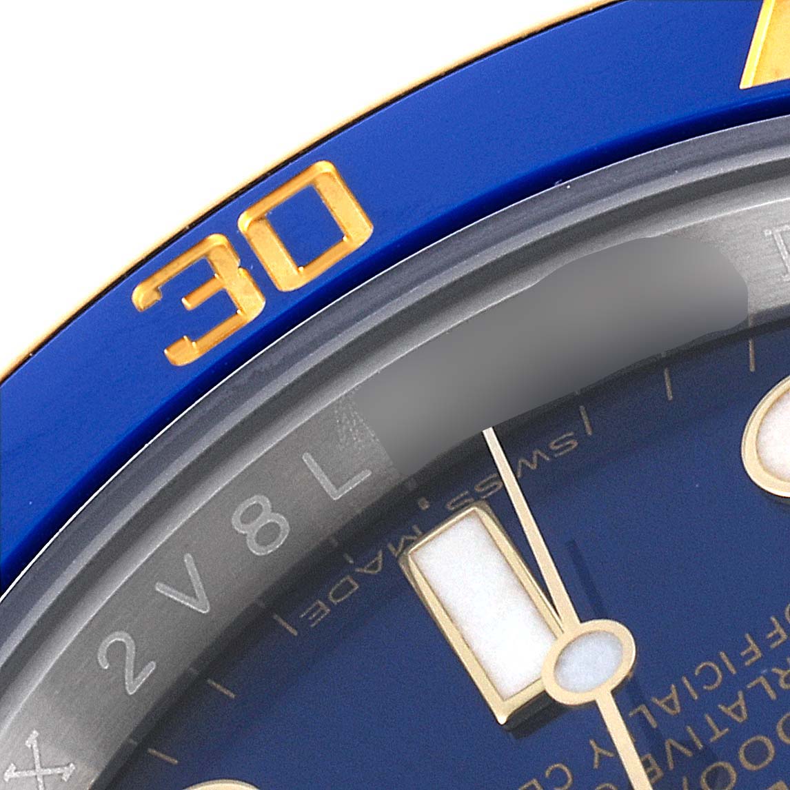 This image shows a close-up view of the bezel and part of the dial of a Rolex Submariner 116613 Men
s Steel and Gold (two tone) Blue Dial 116613 Men
s Steel and Gold (two tone) Blue Dial watch.