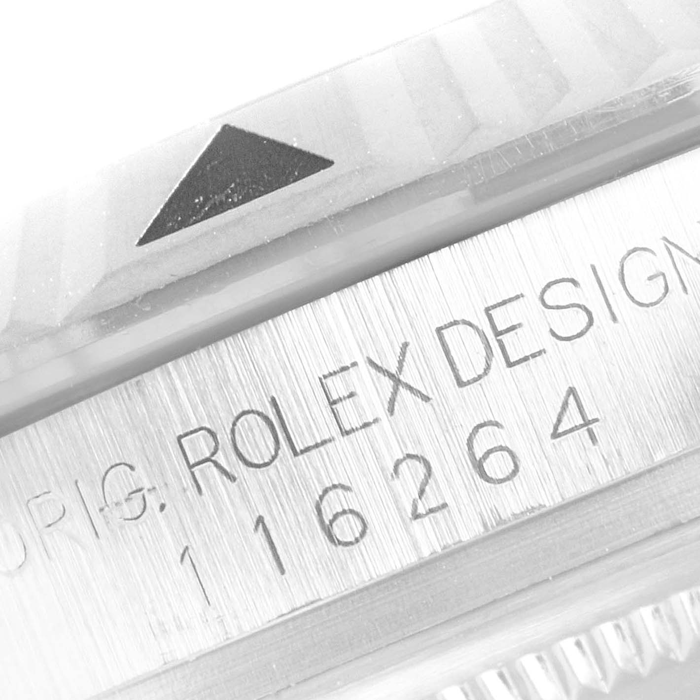 The image shows a close-up of the side of a Rolex Turn-o-Graph 116264 Men
s Stainless Steel White Dial 116264 Men
s Stainless Steel White Dial model, featuring the bezel and the engraved model number.