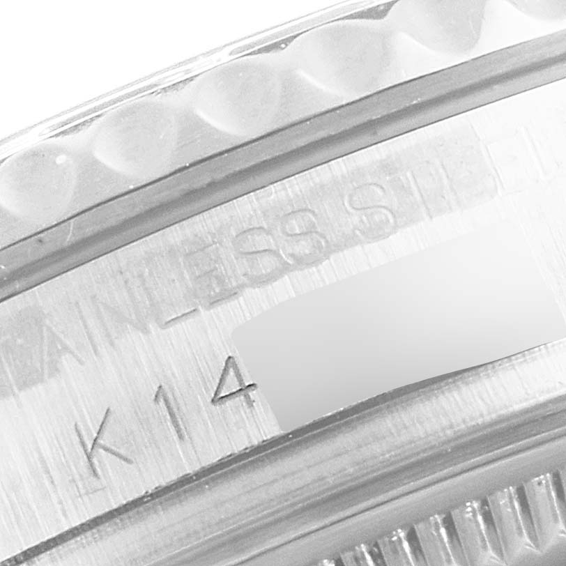 This close-up shows the side of the bezel and the engraved serial number on the Rolex Yacht-Master 168622 Men
s Stainless Steel Silver Dial 168622 Men
s Stainless Steel Silver Dial watch.