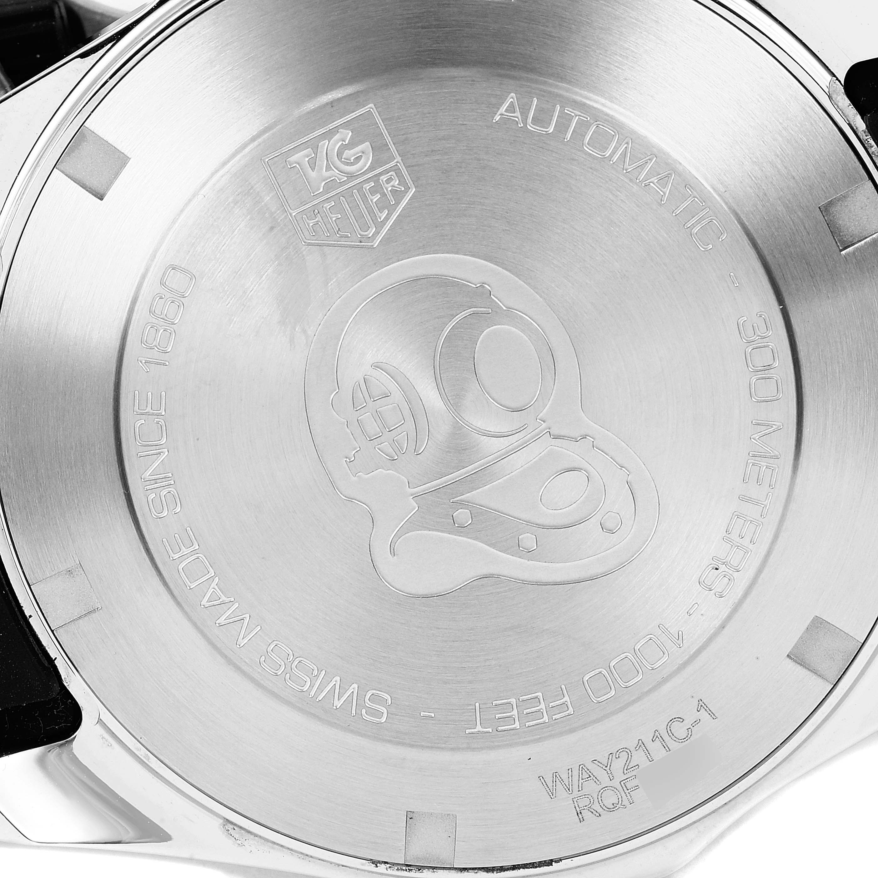 This image shows the case back of a Tag Heuer Aquaracer WAY211C-1 Men's Stainless Steel Blue Dial WAY211C-1 Men's Stainless Steel Blue Dial watch, displaying engravings and branding.