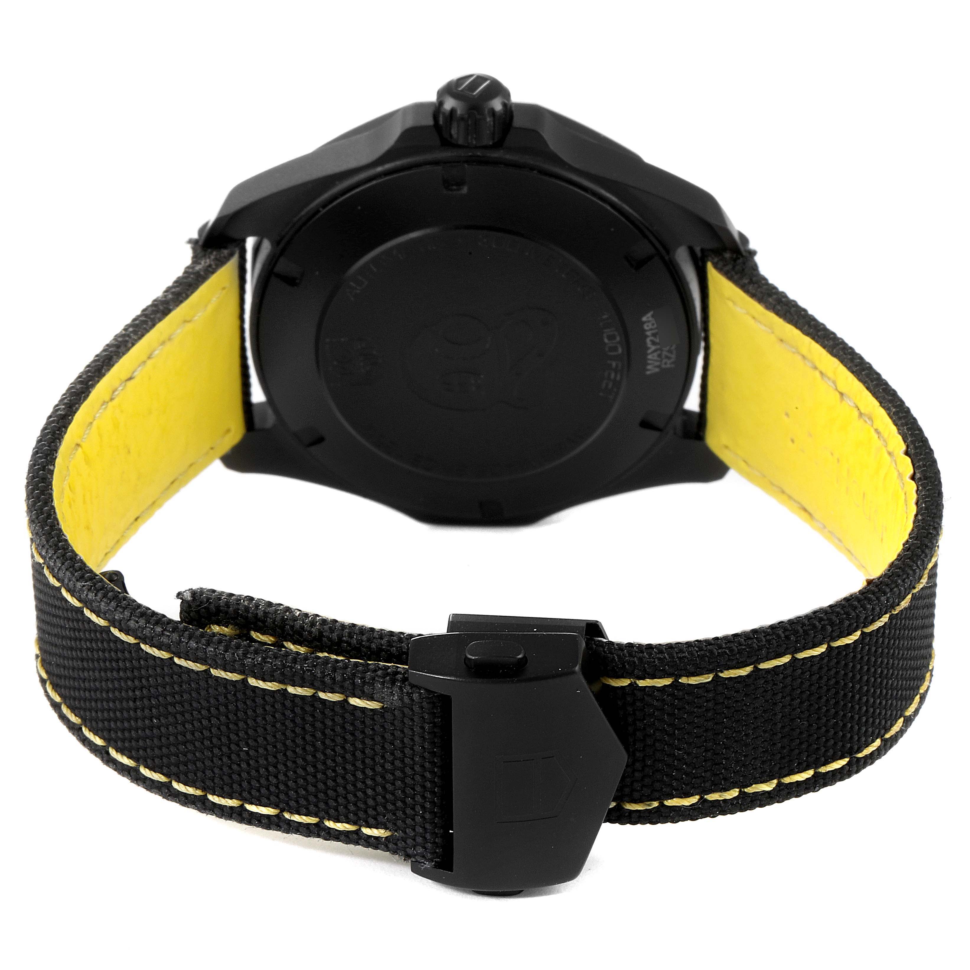 The image shows the back of the Tag Heuer Aquaracer WAY218A.FC6362 Men's Stainless Steel Black Dial WAY218A.FC6362 Men's Stainless Steel Black Dial watch, highlighting the case back and the yellow inner lining of the strap.