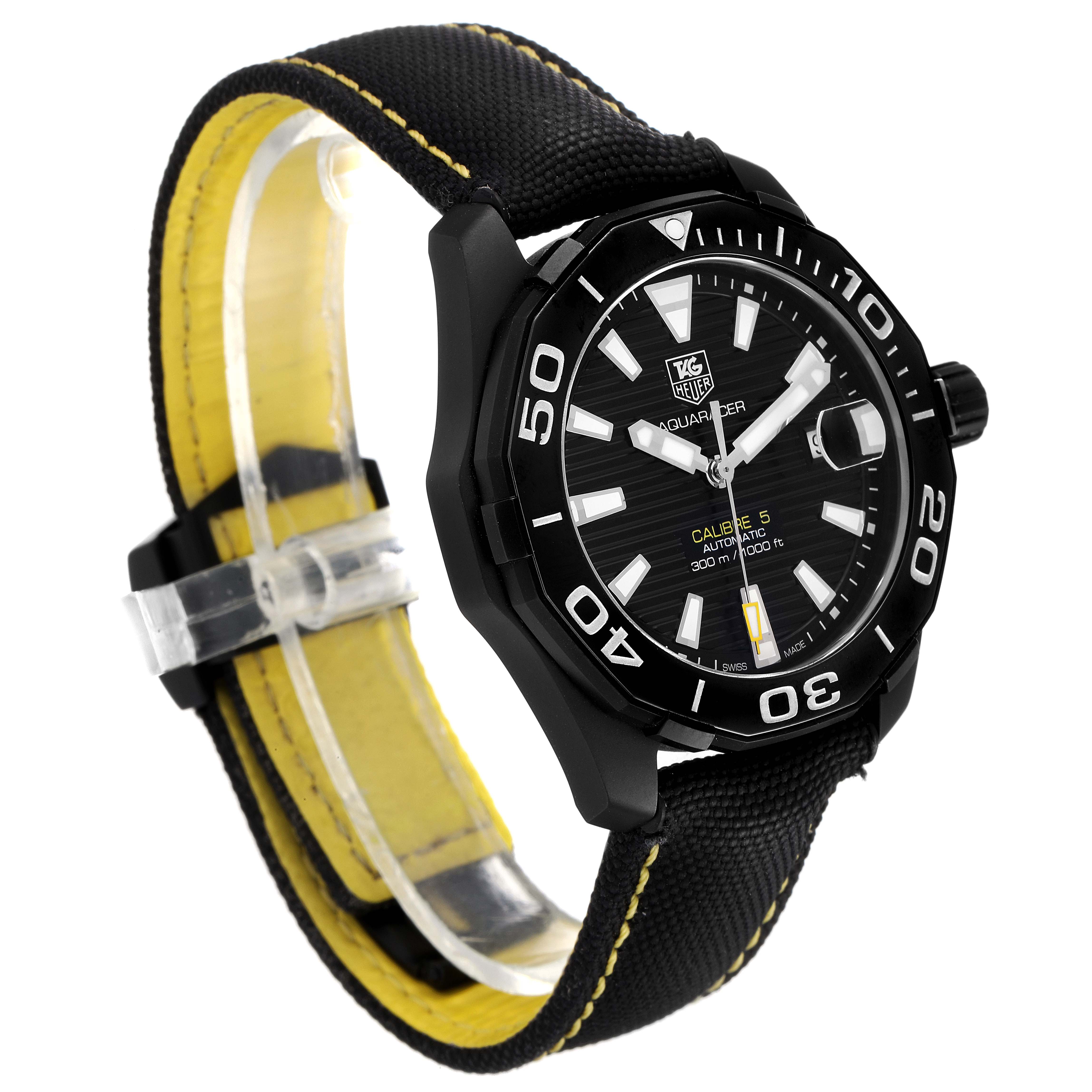 This Tag Heuer Aquaracer WAY218A.FC6362 Men's Stainless Steel Black Dial WAY218A.FC6362 Men's Stainless Steel Black Dial watch is shown in a side angle, highlighting its black case, bezel, dial, and black strap with yellow stitching.