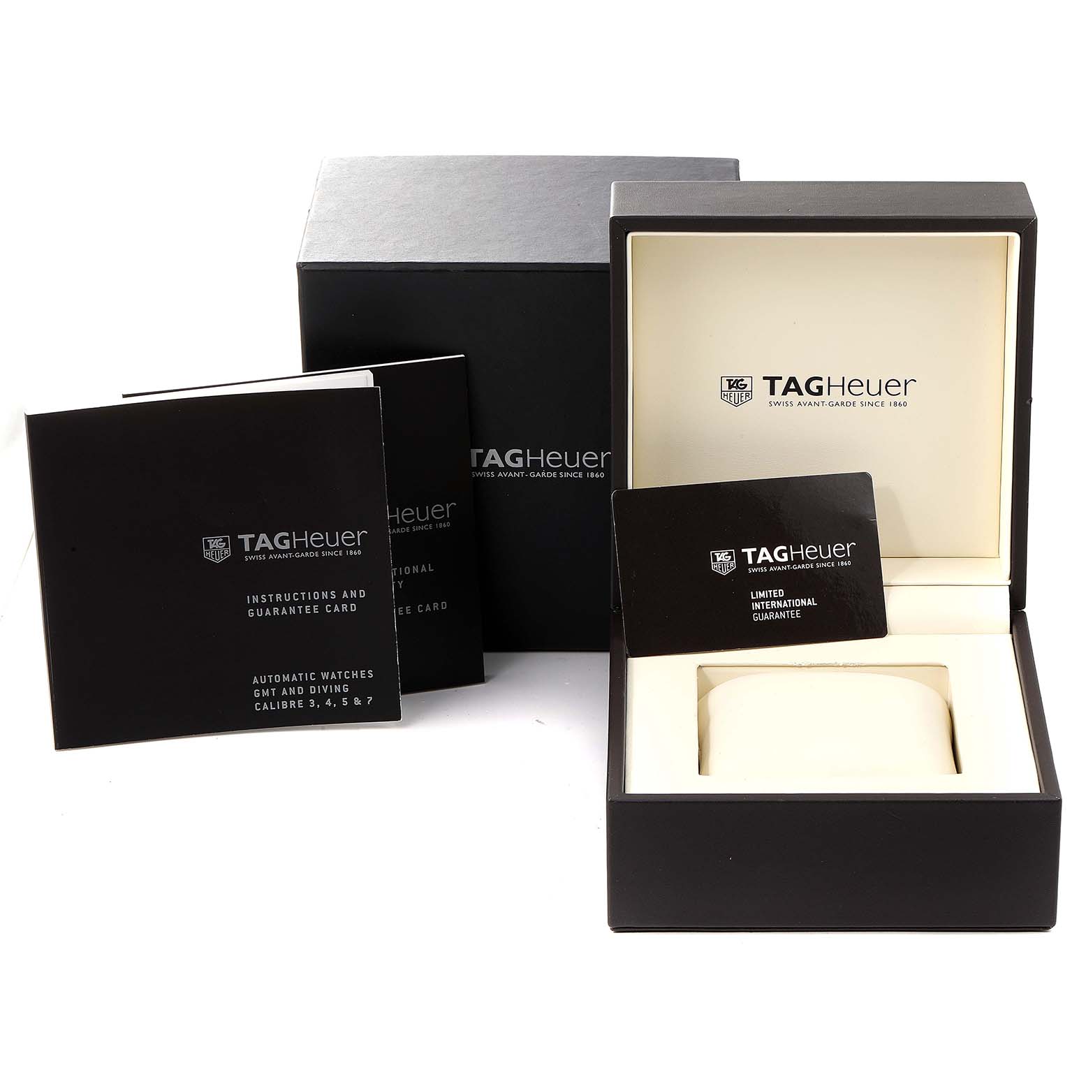 The image shows the packaging, instructions, and guarantee card for the Tag Heuer Aquaracer WAY218A.FC6362 Men's Stainless Steel Black Dial WAY218A.FC6362 Men's Stainless Steel Black Dial watch.