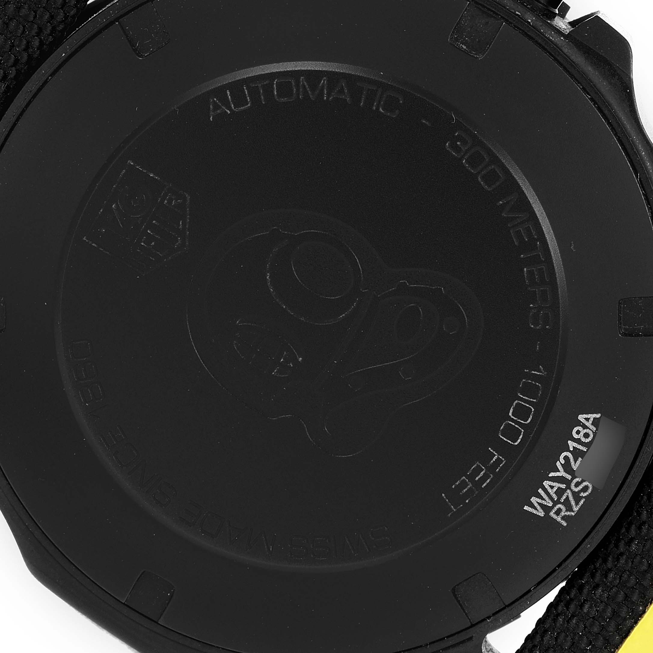 The image shows the back case of the Tag Heuer Aquaracer WAY218A.FC6362 Men's Stainless Steel Black Dial WAY218A.FC6362 Men's Stainless Steel Black Dial watch model, highlighting its water resistance and branding details.