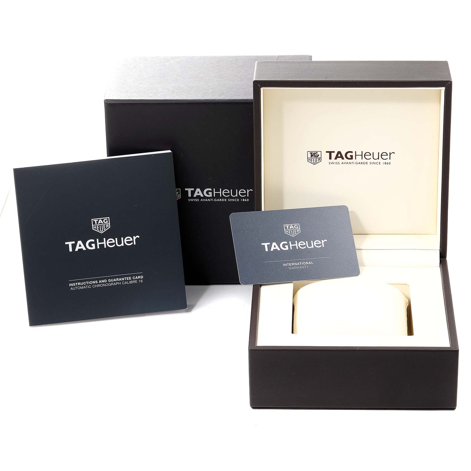 The image shows the packaging, instruction manual, and warranty card for the Tag Heuer Carrera CV201AP.FC6429 Men's Stainless Steel Black Dial CV201AP.FC6429 Men's Stainless Steel Black Dial watch model.