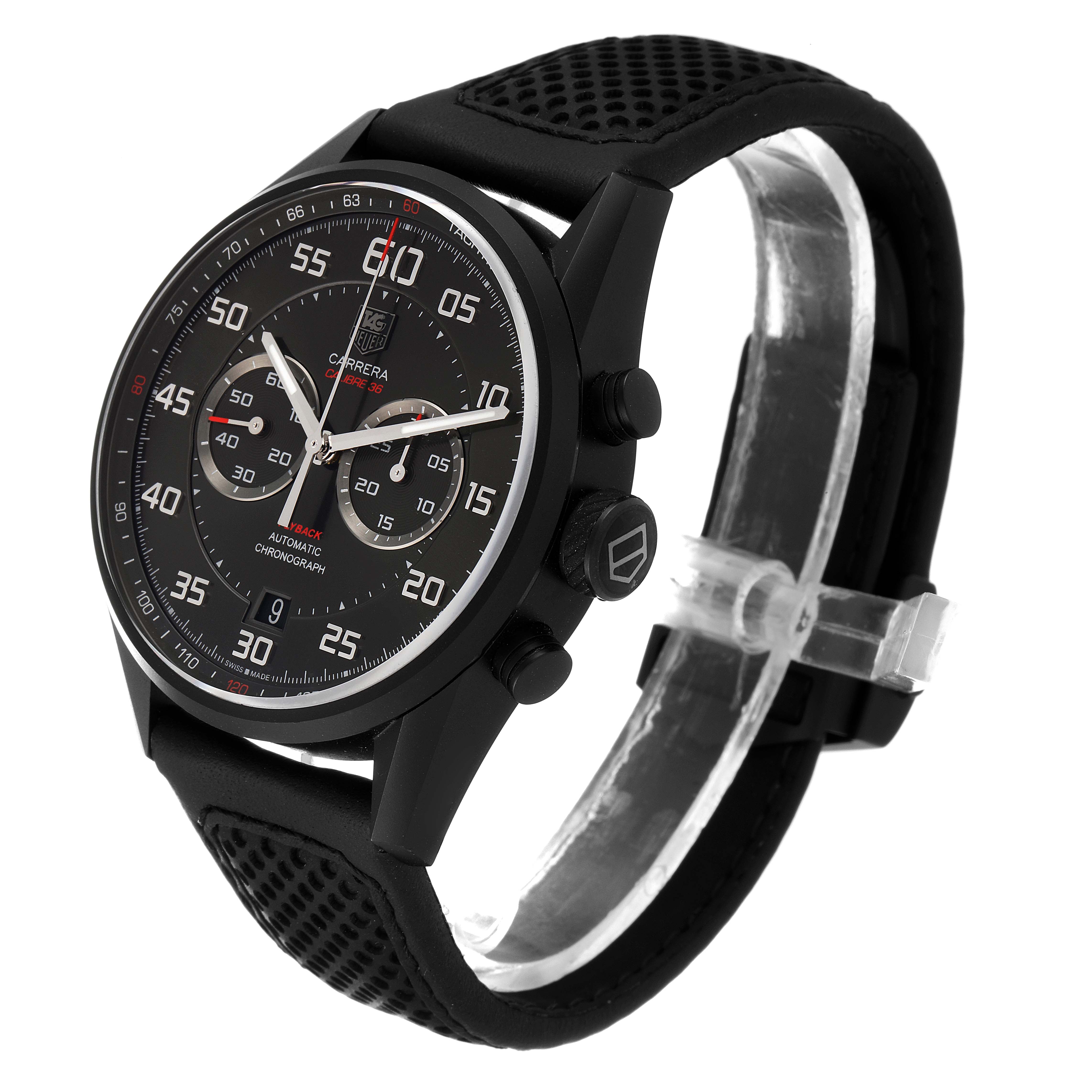 The image shows a side and front angle of a Tag Heuer Carrera CAR2B80.FC6325 Men's Titanium Black Dial CAR2B80.FC6325 Men's Titanium Black Dial watch, highlighting its black dial, chronograph, and perforated black strap.