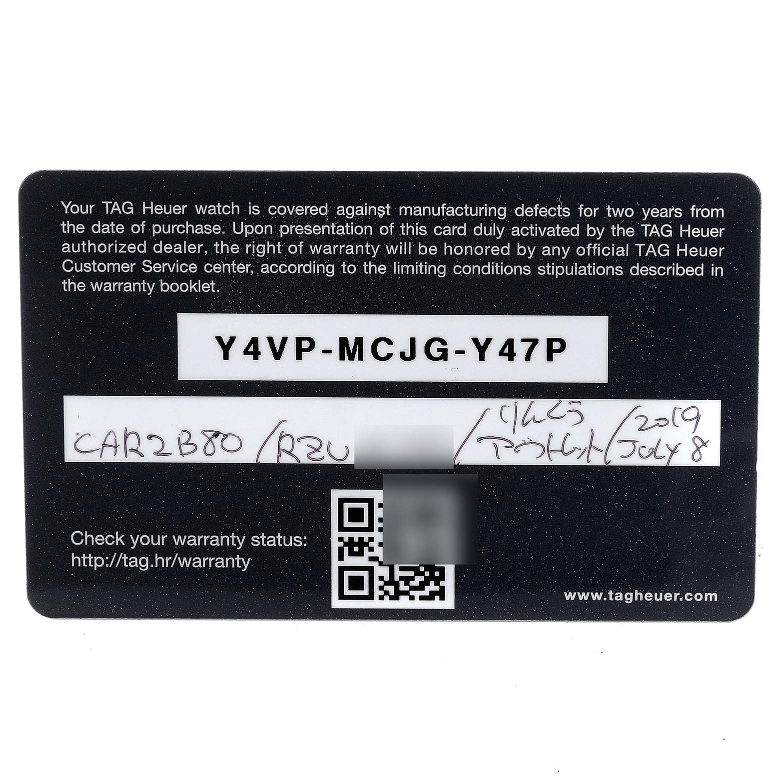 A Tag Heuer Carrera CAR2B80.FC6325 Men's Titanium Black Dial CAR2B80.FC6325 Men's Titanium Black Dial model warranty card is shown from a top-down angle, displaying a serial code and purchase details.