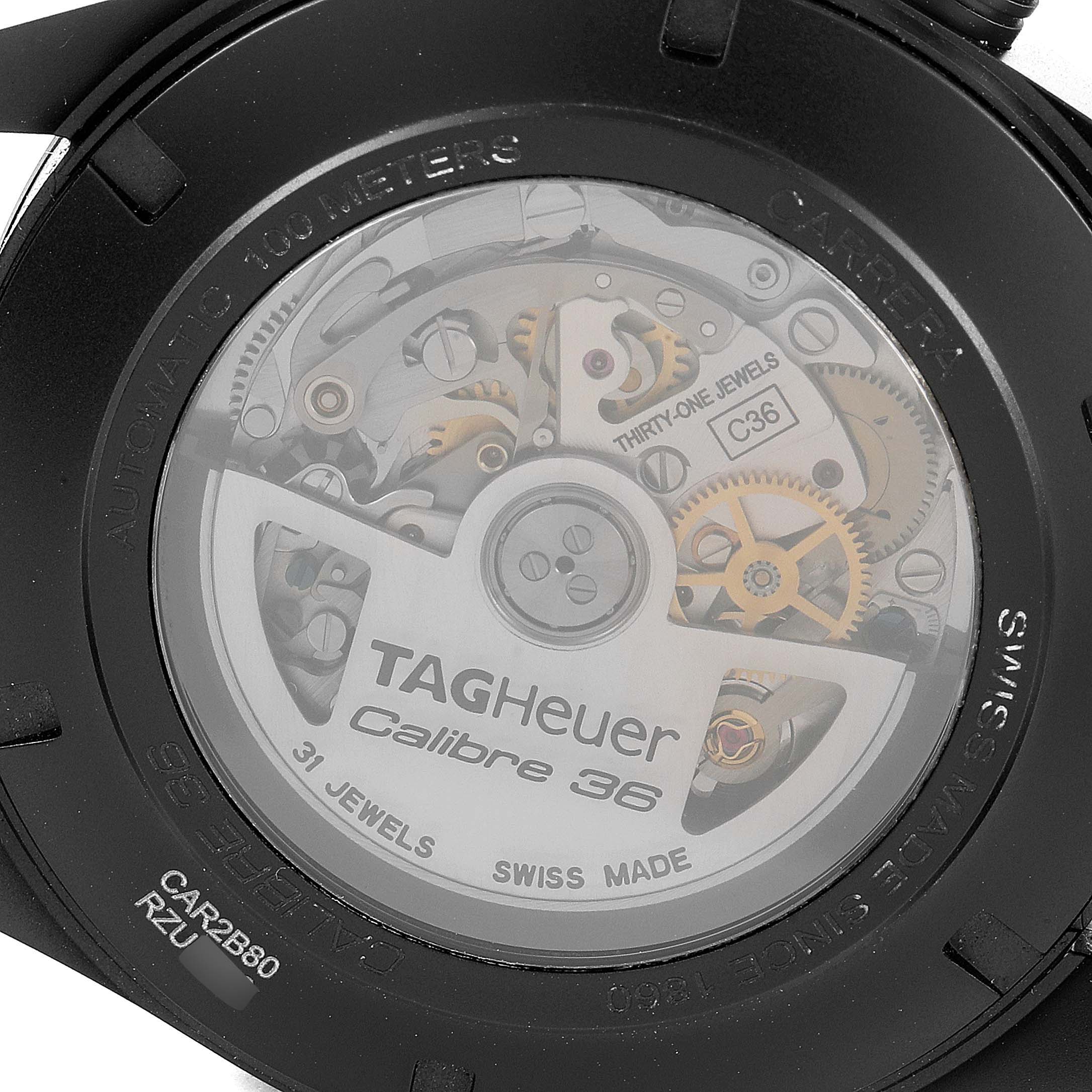 The image shows the back view of the Tag Heuer Carrera CAR2B80.FC6325 Men's Titanium Black Dial CAR2B80.FC6325 Men's Titanium Black Dial watch, highlighting its exposed Calibre 36 movement and intricate components.