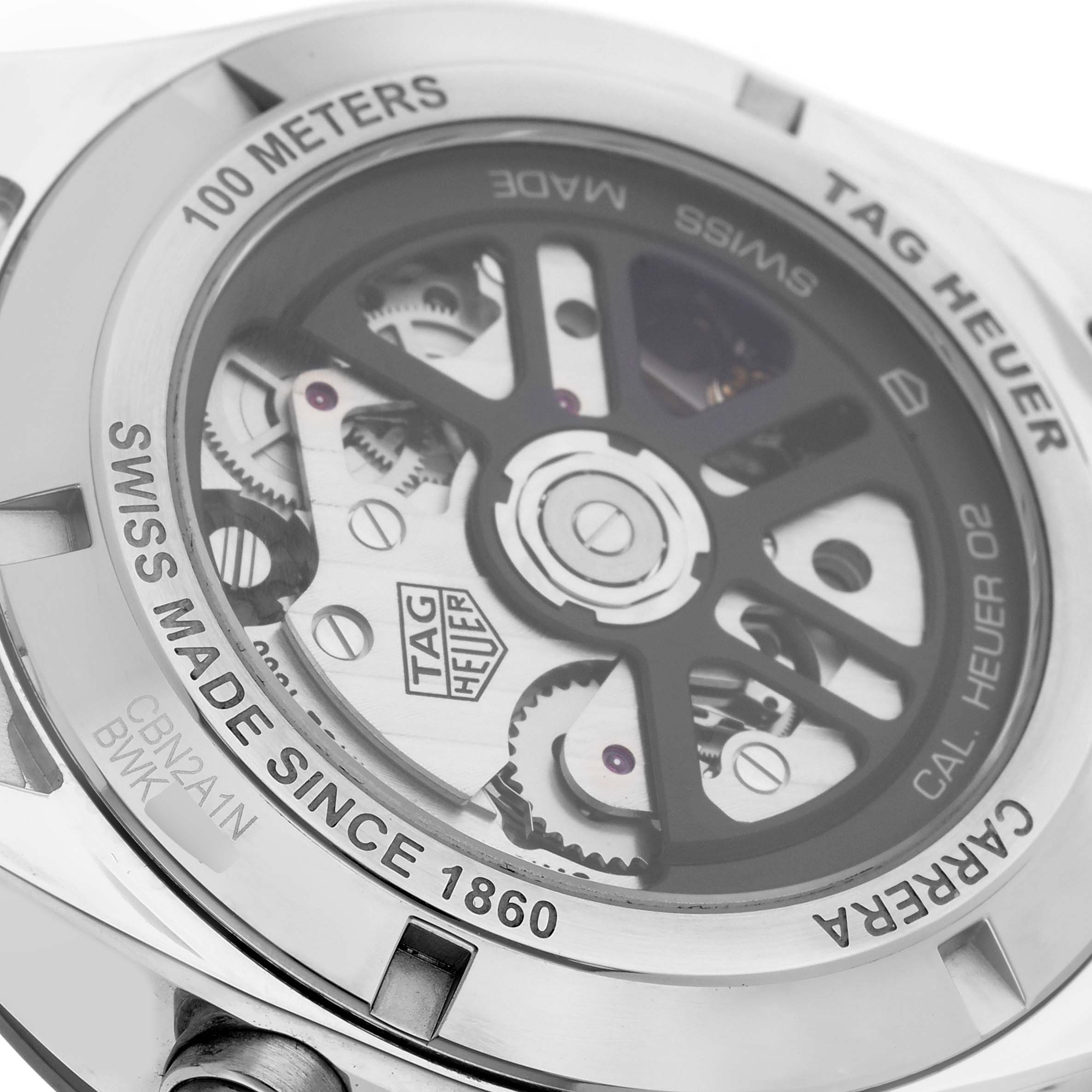 The image shows the back of a Tag Heuer Carrera CBN2A1N.BA0643 Men's Stainless Steel Green Dial CBN2A1N.BA0643 Men's Stainless Steel Green Dial, displaying the movement and engravings for water resistance and origin.