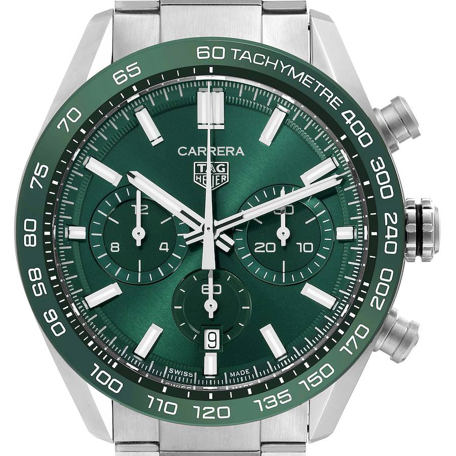 The Tag Heuer Carrera watch is shown from a frontal angle, highlighting its green dial, chronograph subdials, and tachymetre scale.