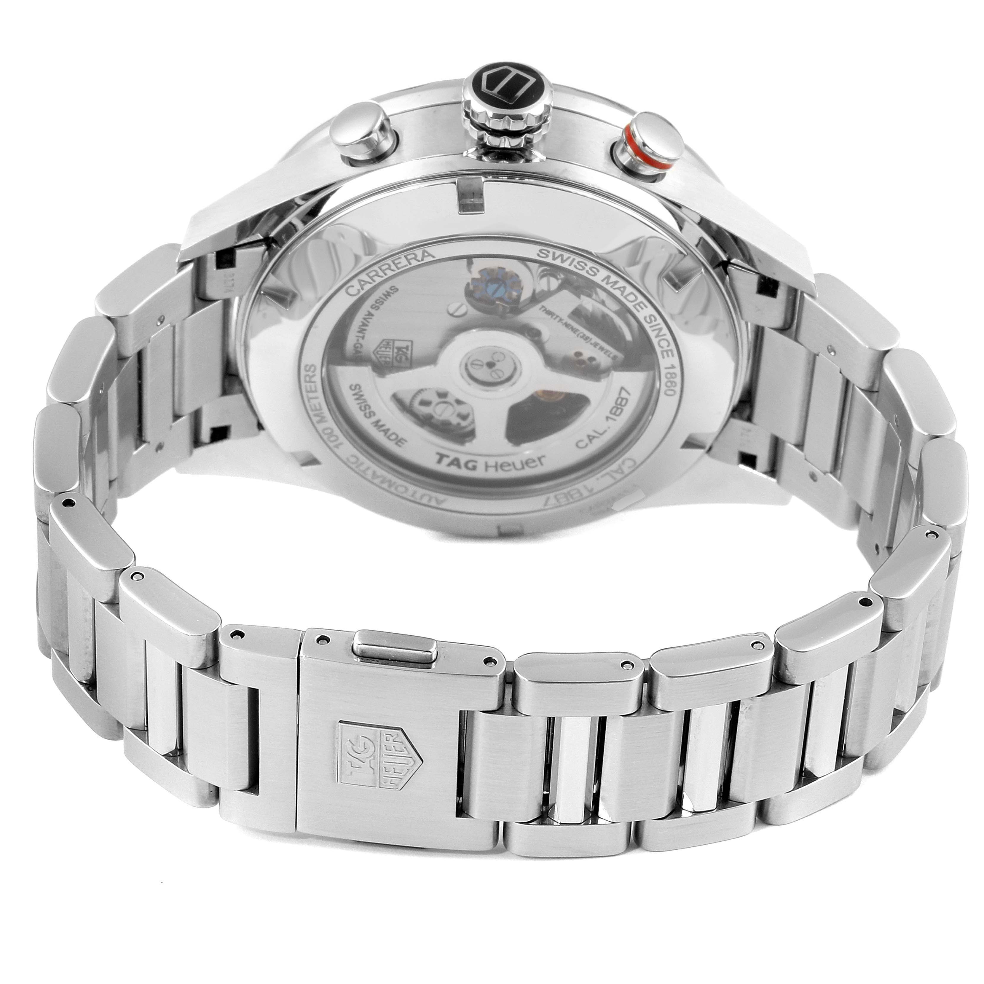 The image shows the back view of a Tag Heuer Carrera CAR2A11.BA0799 Men's Stainless Steel Grey Dial CAR2A11.BA0799 Men's Stainless Steel Grey Dial watch, displaying its movement and part of the stainless steel bracelet.