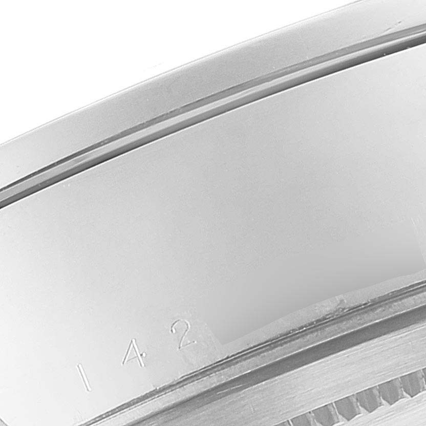 The image shows a close-up view of the case side and bezel of a Tudor Glamour M56000-0008 Men's Stainless Steel Silver Dial M56000-0008 Men's Stainless Steel Silver Dial watch.