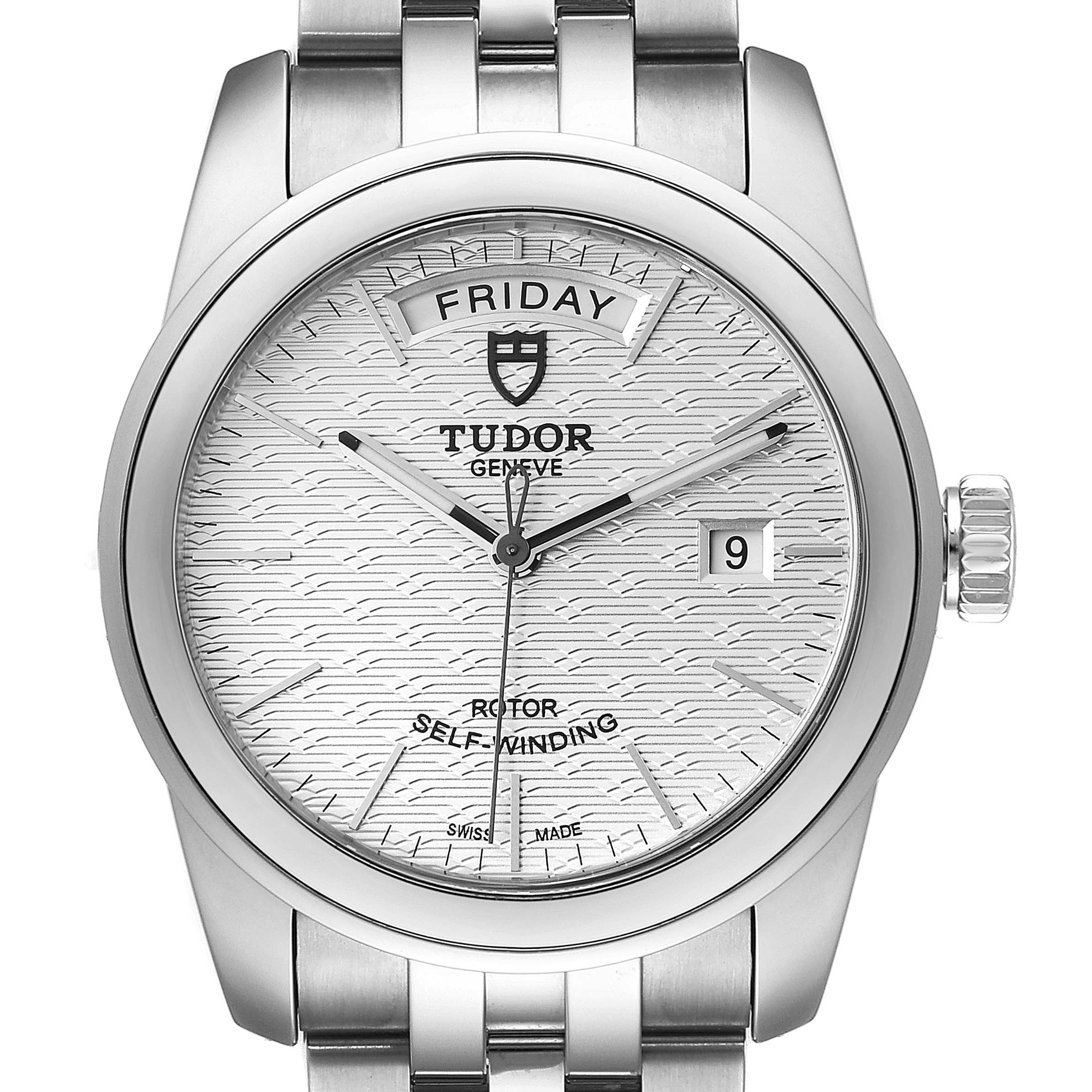 The image shows a front view of the Tudor Glamour M56000-0008 Men's Stainless Steel Silver Dial M56000-0008 Men's Stainless Steel Silver Dial model watch, focusing on its dial with day and date indicators.