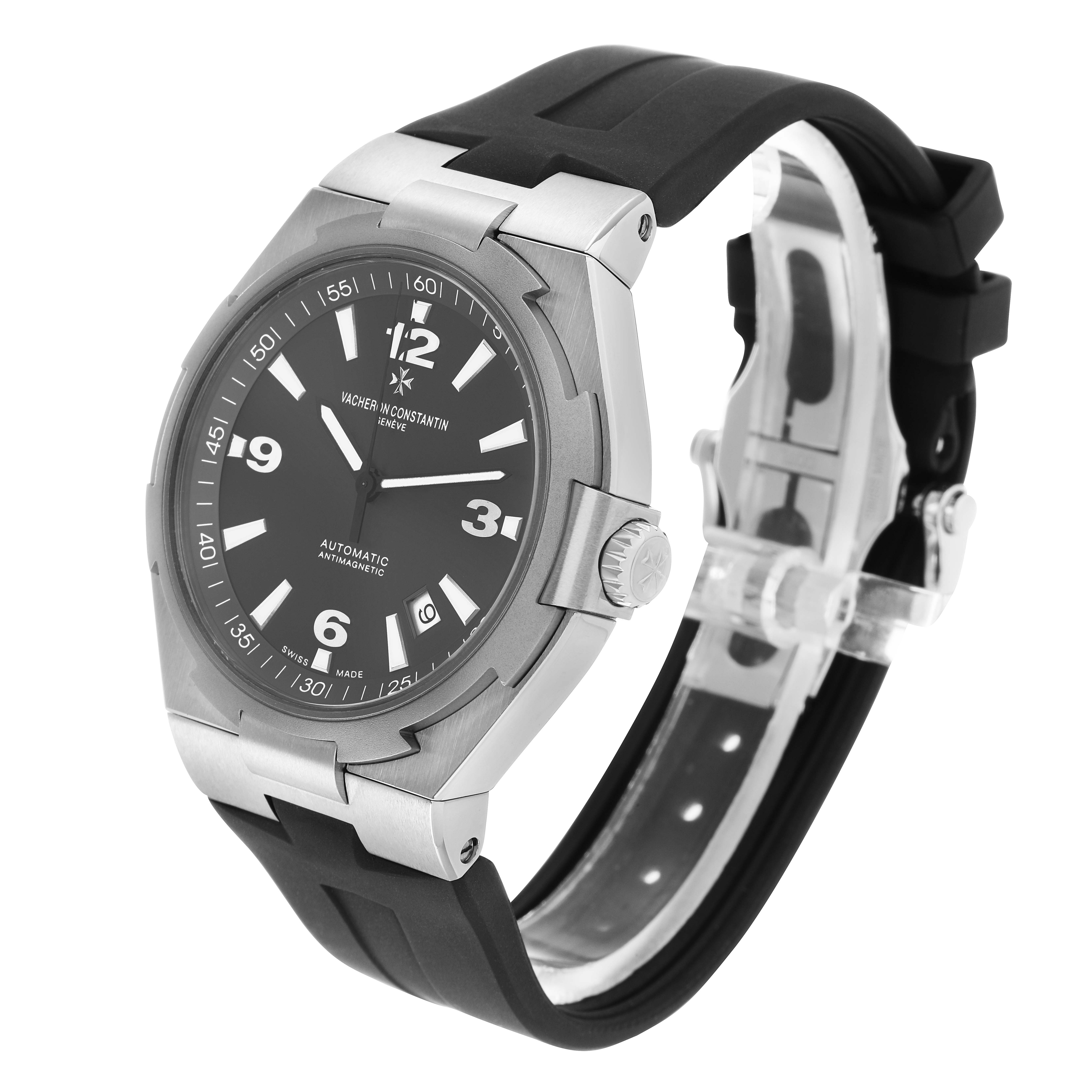 The Vacheron Constantin Overseas 47040 Men's Stainless Steel Grey Dial watch is shown at a side angle, displaying the face, bezel, crown, and strap.