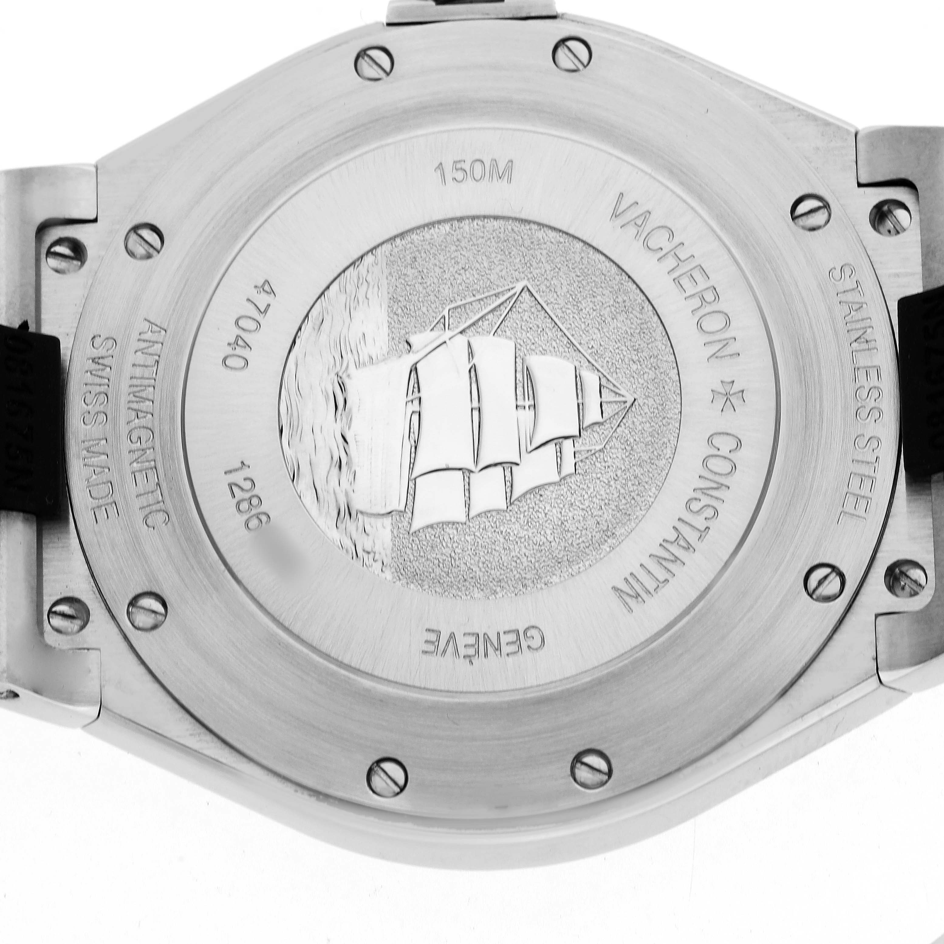 The image shows the case back of a Vacheron Constantin Overseas 47040 Men's Stainless Steel Grey Dial watch, featuring an engraved ship and specifications.