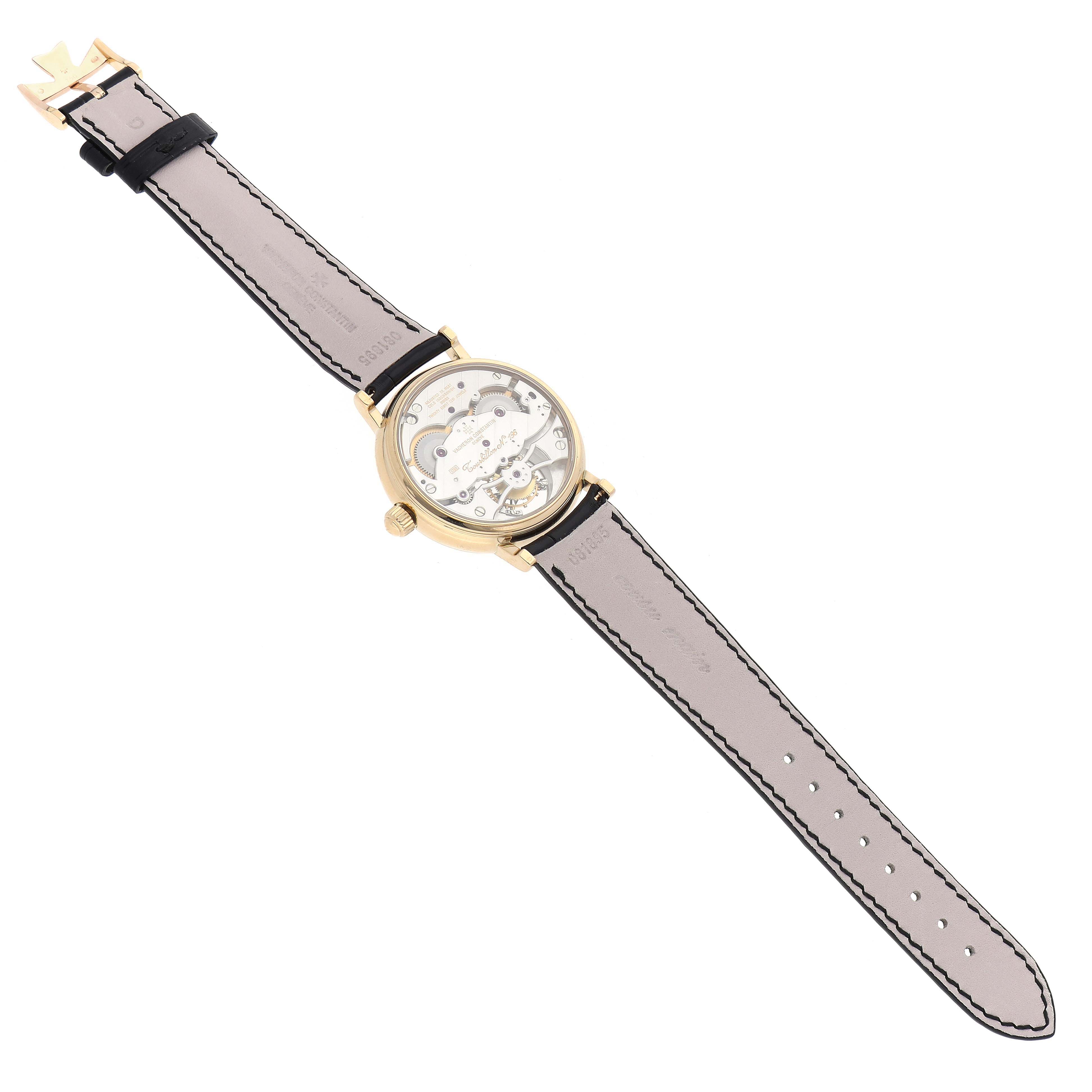 The Vacheron Constantin Patrimony 30050/000J-7604 Men's Yellow Gold White Dial 30050/000J-7604 Men's Yellow Gold White Dial watch is shown from the back, highlighting its open case back and leather strap.