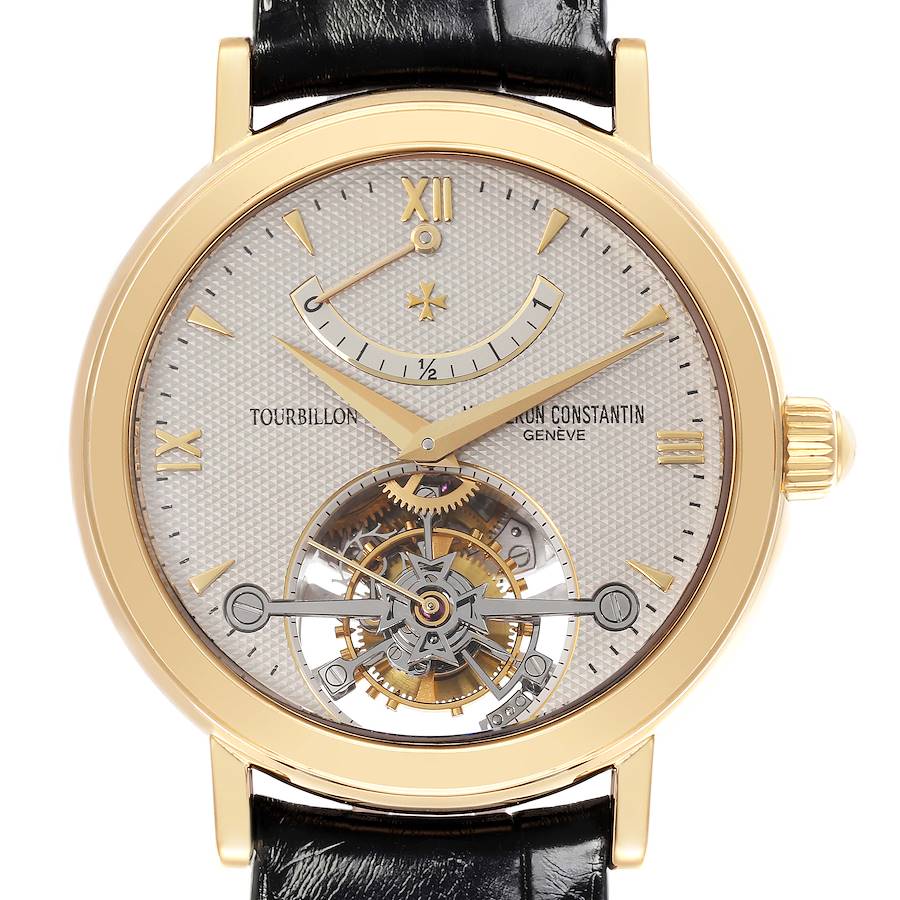 The Vacheron Constantin Patrimony watch is shown from a front angle, highlighting the face and tourbillon mechanism.