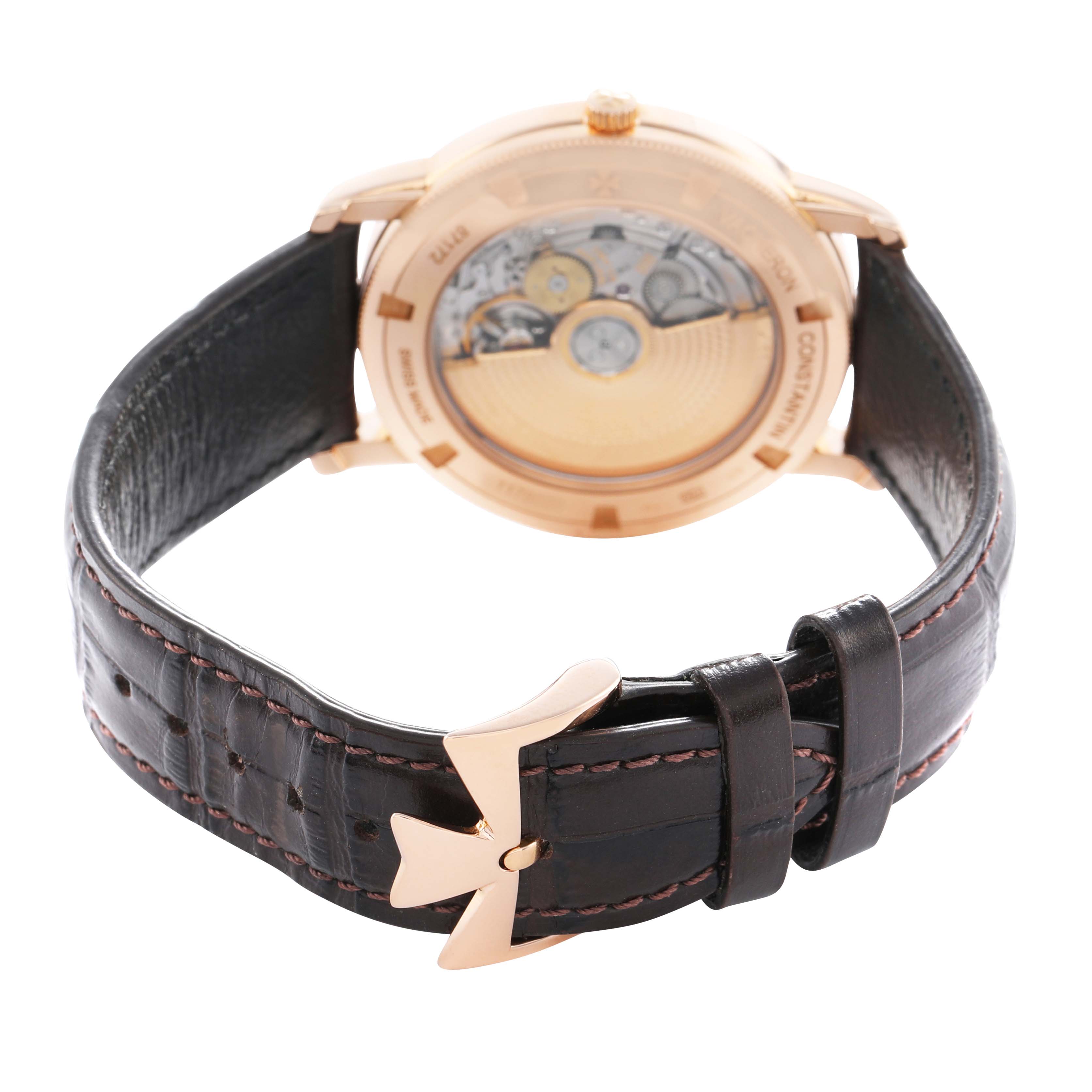 The image shows the back view of a Vacheron Constantin Traditionnelle 87172 Men's Rose Gold Silver Dial watch, highlighting its mechanical movement and leather strap.
